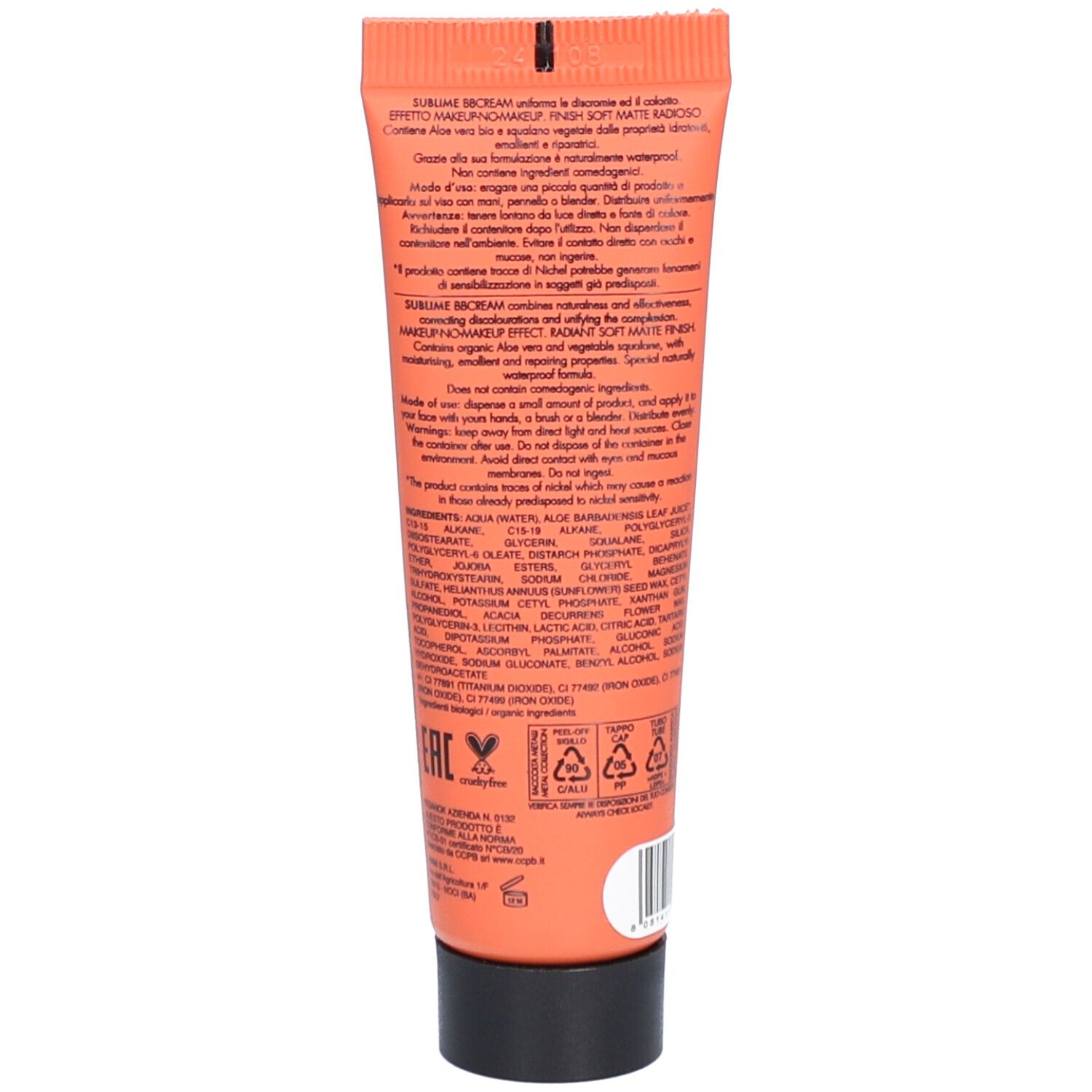 Dos d'un tube orange. Texte: ingrédients, mode d'emploi, informations fabricant. Bouchon noir.
