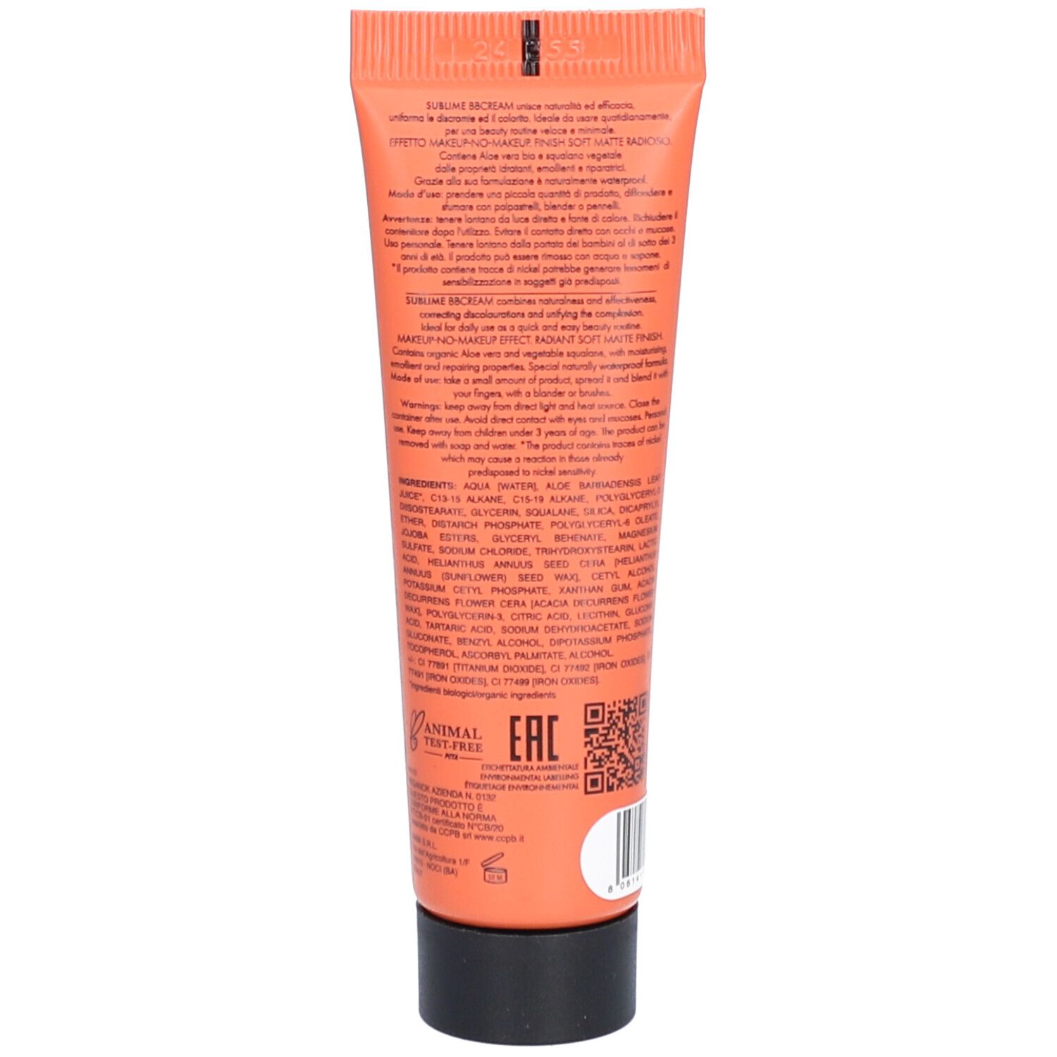 Dos d'un tube orange avec bouchon noir. Texte: ingrédients, instructions d'utilisation, logo Animal Tested.