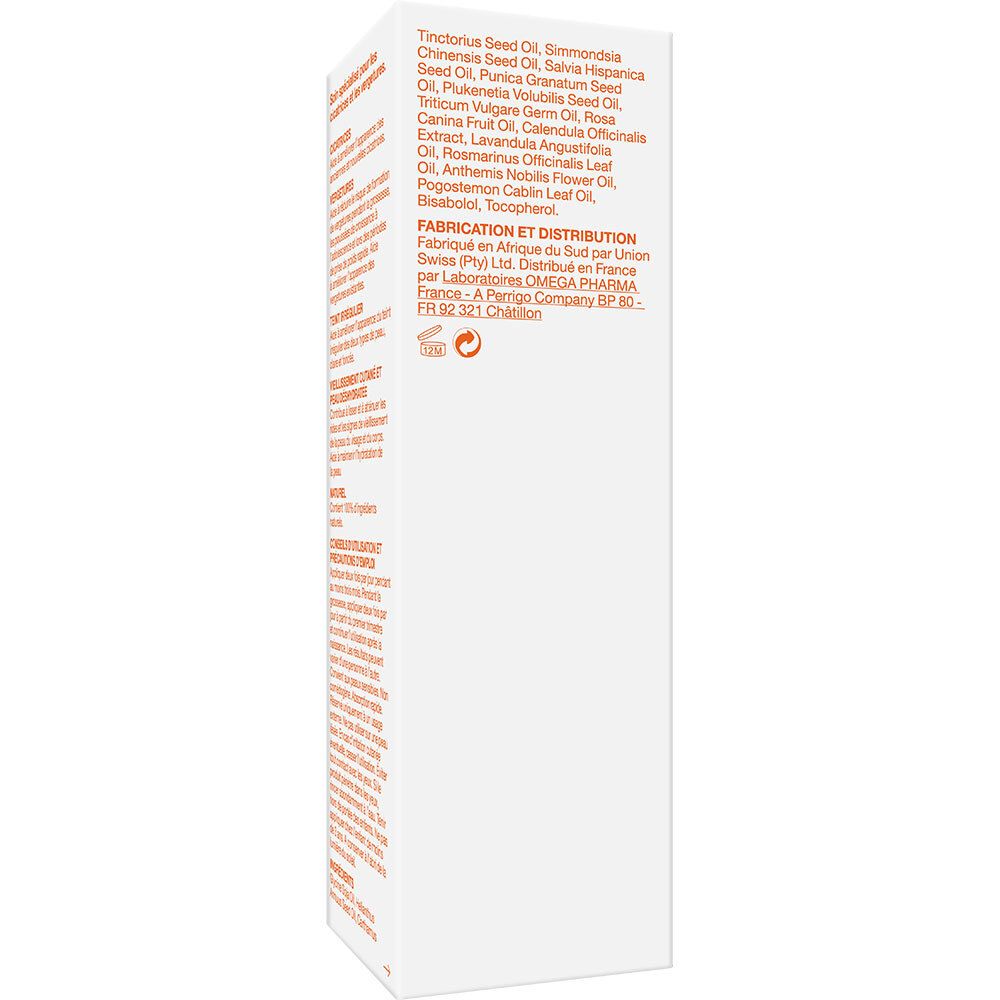 Emballage Bi-Oil. Texte orange. Contient des informations sur les ingrédients, l'utilisation et les précautions. Côté.
