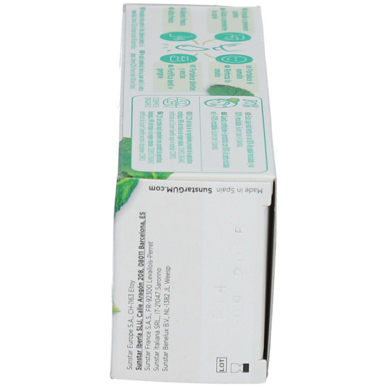 Boîte de dentifrice, vue latérale. Informations fabricant. Certifié bio, label Vegan.