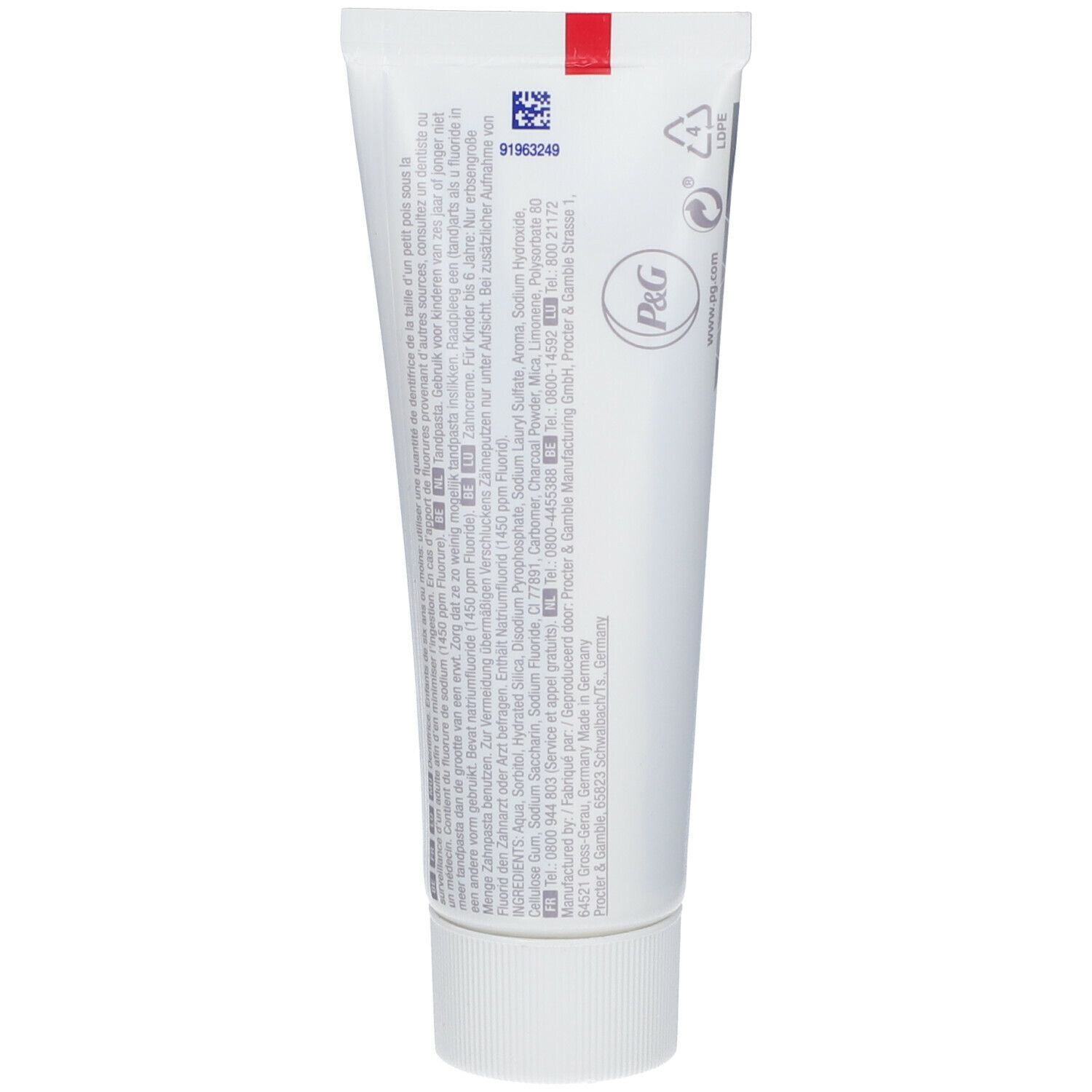 Dos d'un tube de dentifrice blanc. Texte multilingue, informations fabricant et logos.