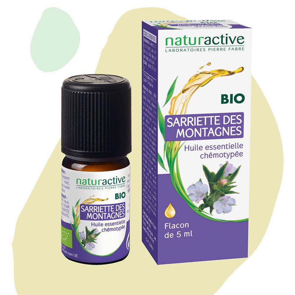 Braune Glasflasche mit schwarzem Deckel und Verpackung. Aufschrift: BIO, Sarriette des montagnes, Huile essentielle chémotypée. Flacon de 5 ml.