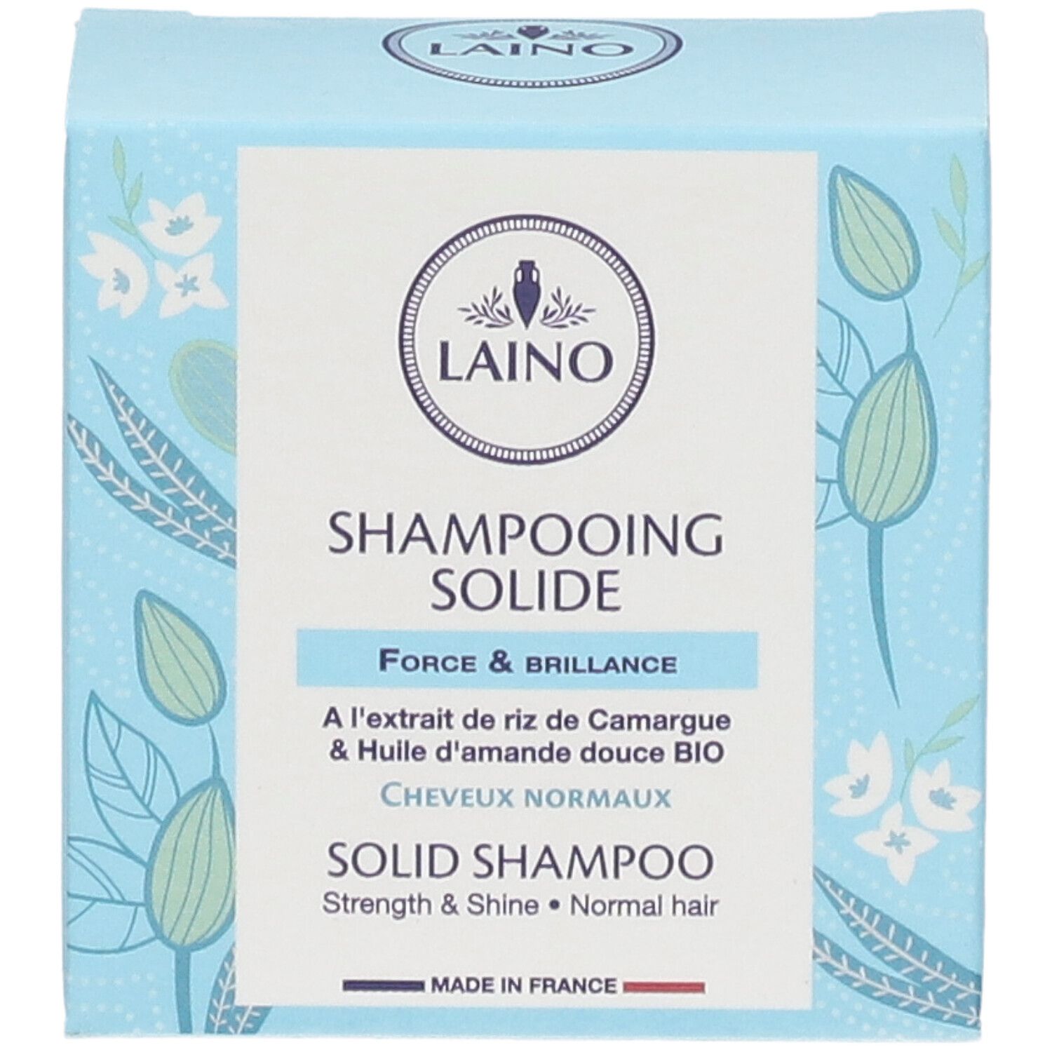 Boîte bleu clair LAINO. Shampooing solide pour cheveux normaux. Extrait de riz et huile d'amande. Fabriqué en France.