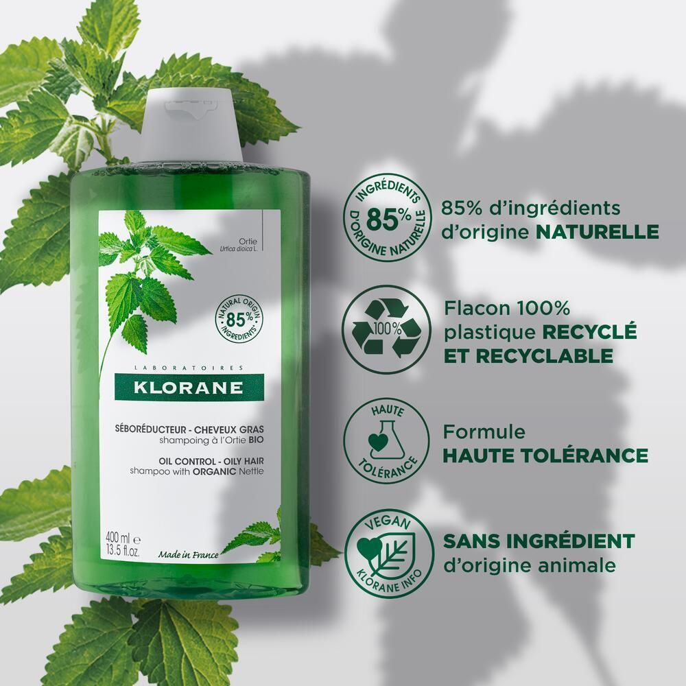 Grüne Flasche mit weißem Deckel. Logos: 85% natürliche Inhaltsstoffe, recycelbar, hohe Verträglichkeit, vegan.
