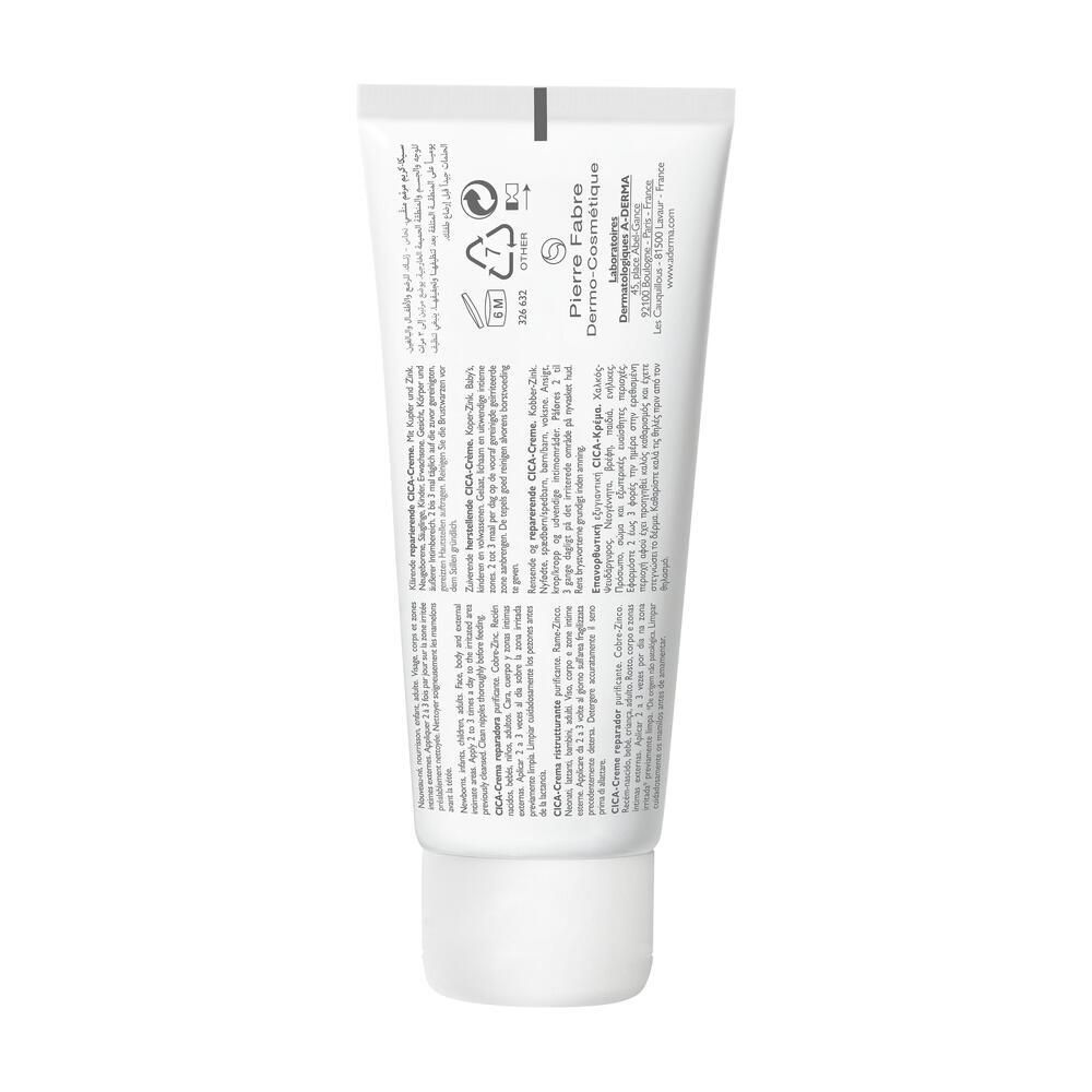 Dos du tube blanc. Texte multilingue. Informations du fabricant.