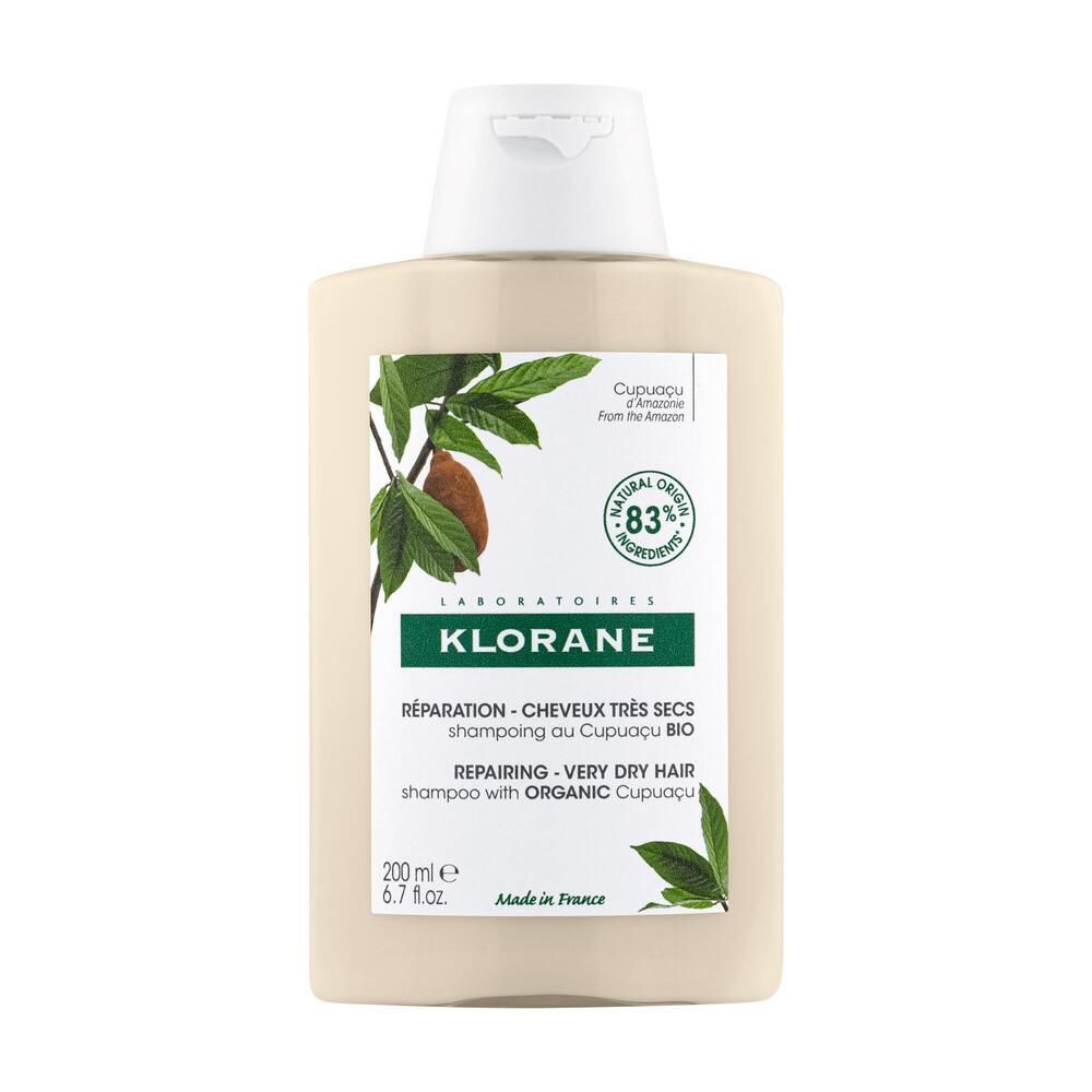 Flacon de shampooing Klorane Cupuaçu BIO. Flacon beige avec bouchon blanc. Contient 83% d'ingrédients d'origine naturelle.