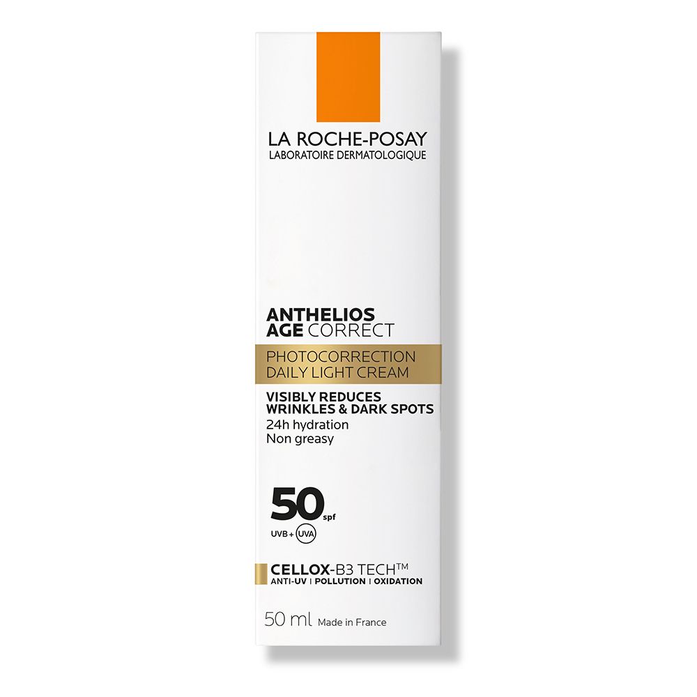 Flacon blanc Anthelios Age Correct SPF 50. Texte: LA ROCHE-POSAY. Réduit rides et taches. Hydratation 24h.