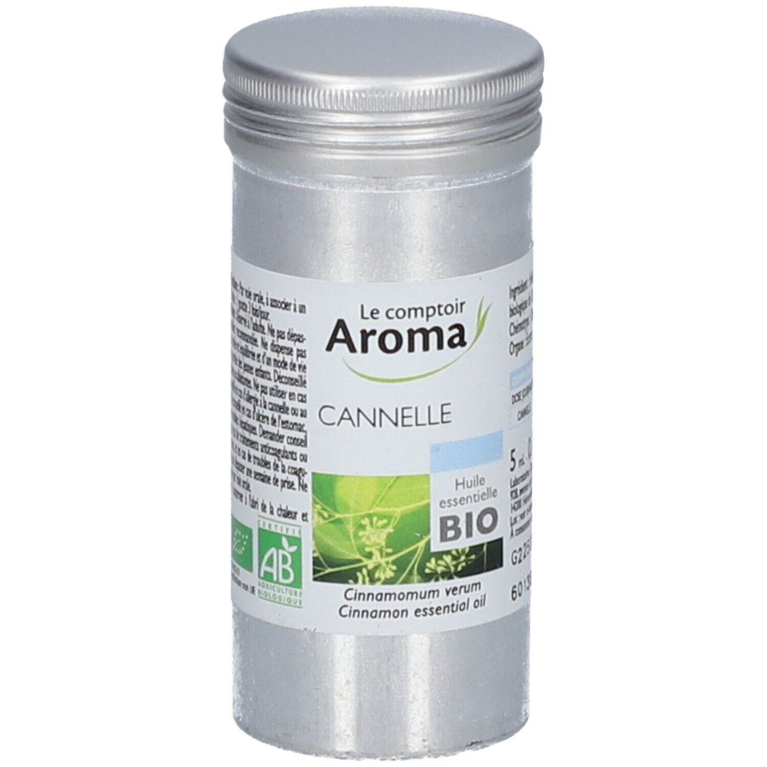 Flacon cylindrique en métal avec bouchon à vis. Étiquette avec logo, nom du produit et certification bio. Contient de l'huile essentielle de cannelle.