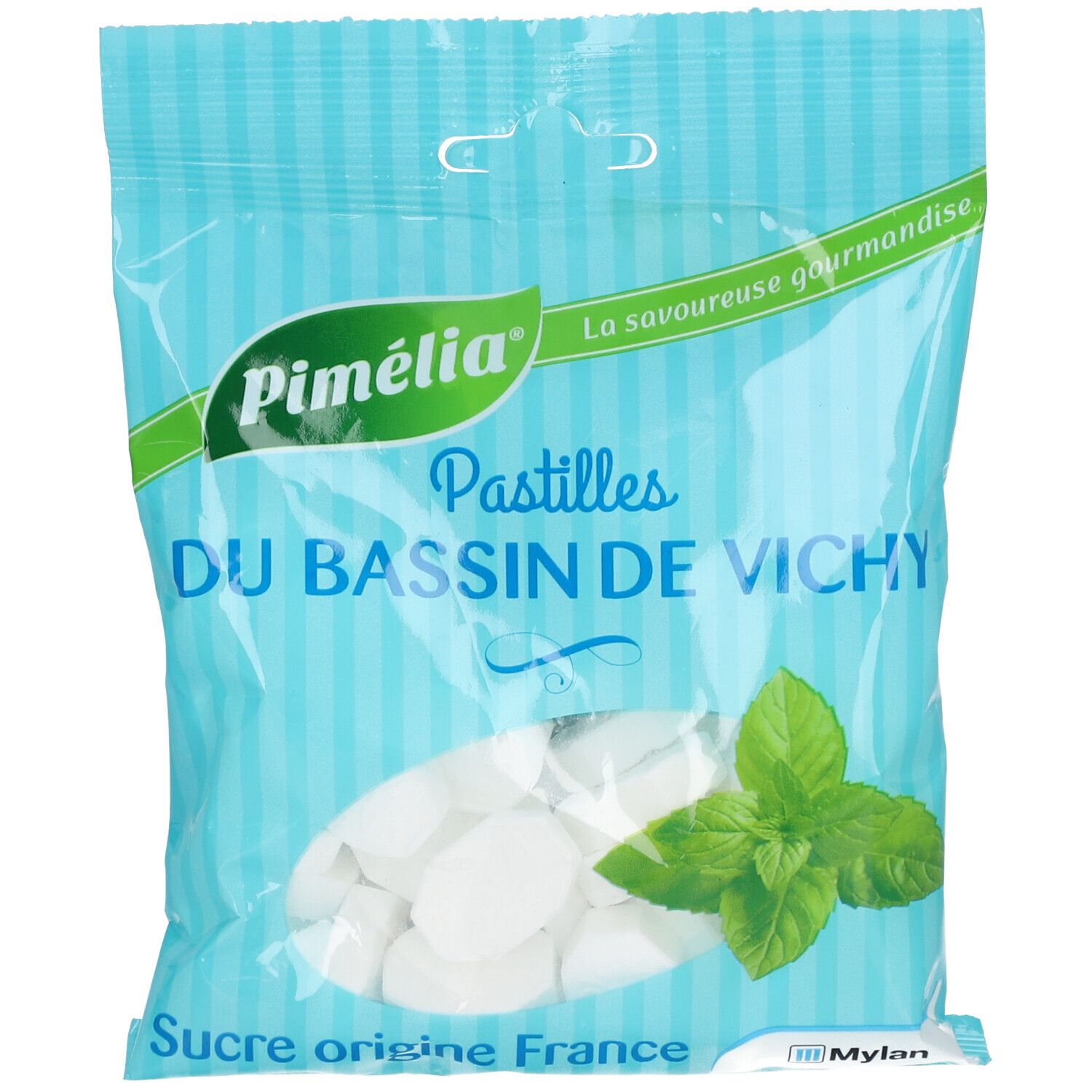 Beutel mit weißen Pastillen, grüne Blätter. Aufschrift: Pimélia, Pastilles du Bassin de Vichy, Sucre origine France.