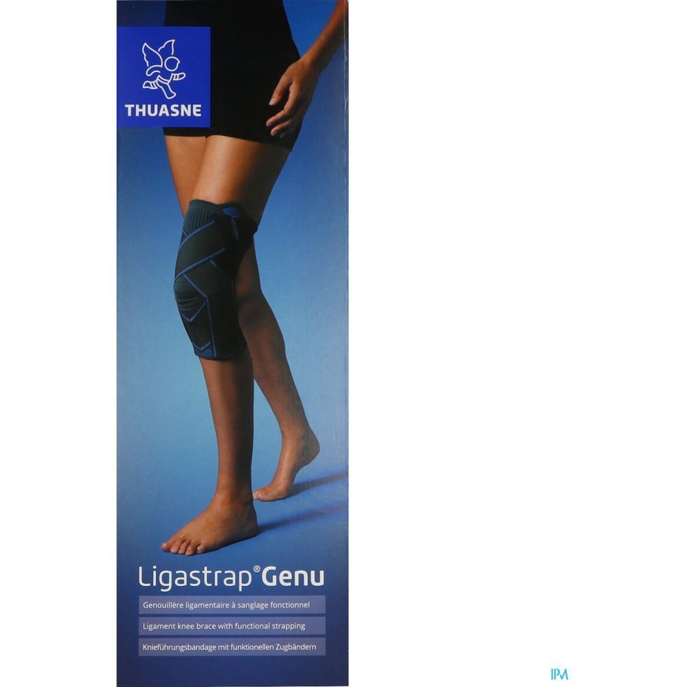 Genouillère sur une jambe. Emballage avec nom du produit et marque Thuasne.