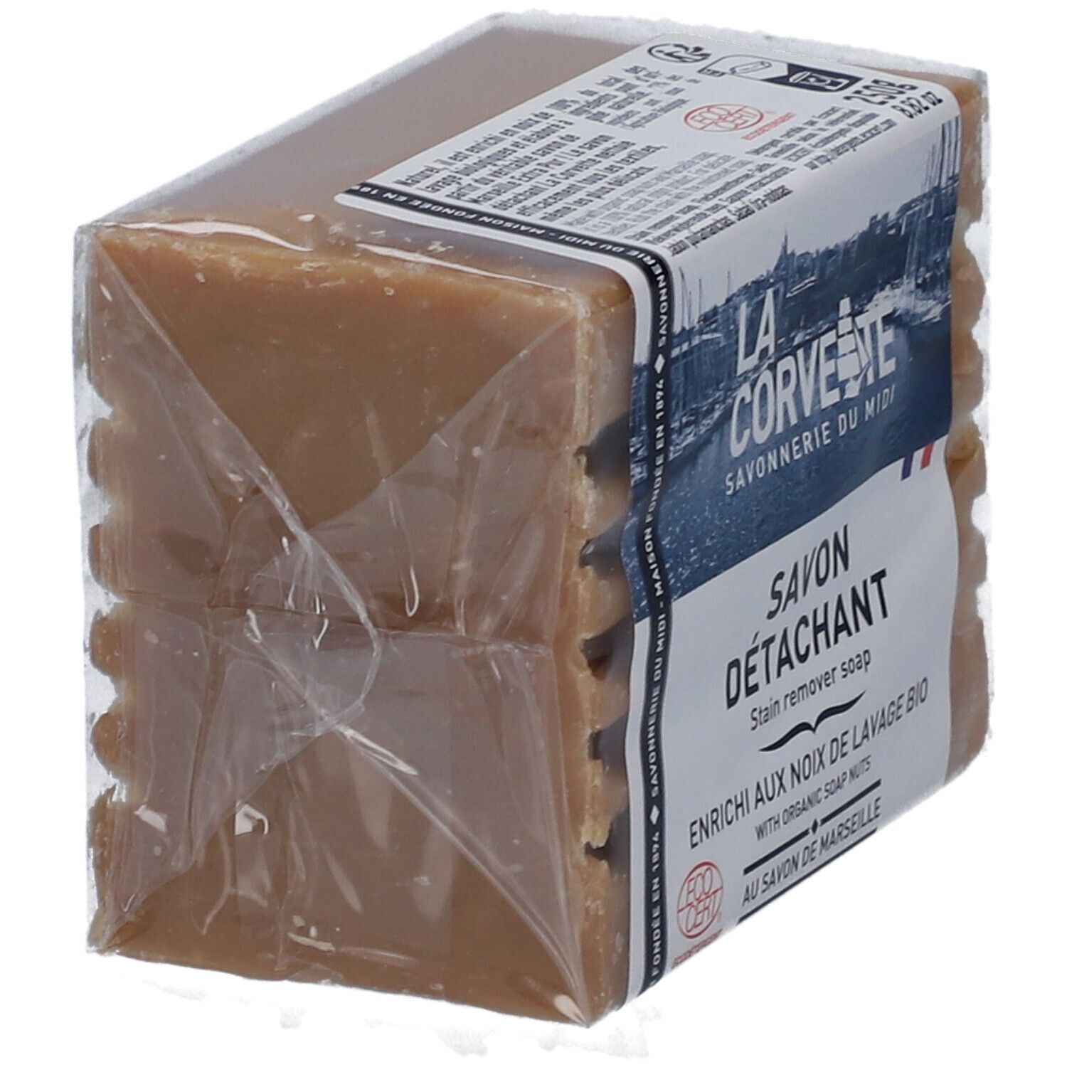 Savon détachant emballé. L'emballage porte les mentions "LA CORVETTE Savonnerie du Midi" et "Savon Détachant".