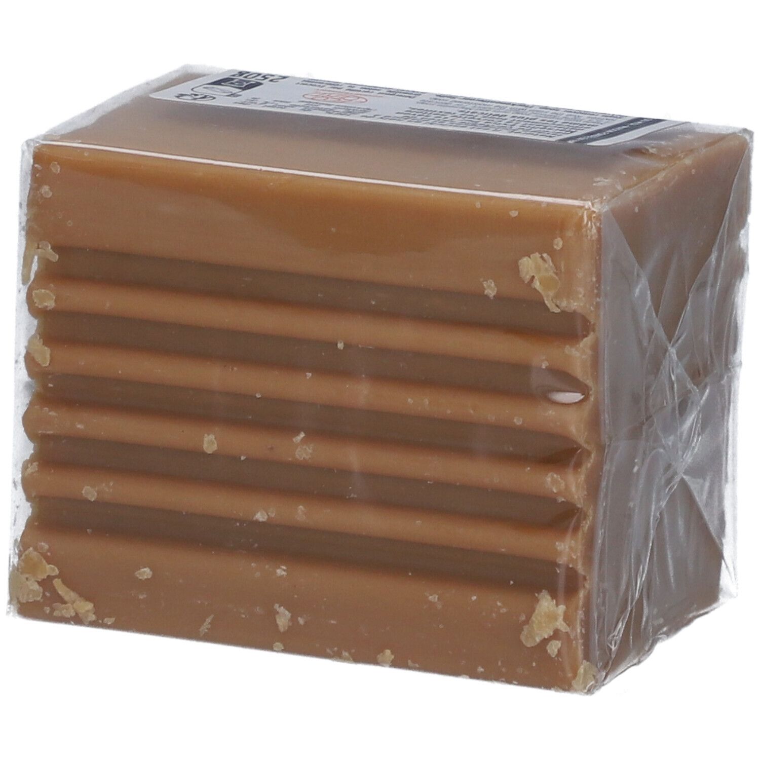 Savon détachant emballé. Le savon est divisé en blocs et emballé dans du film plastique.