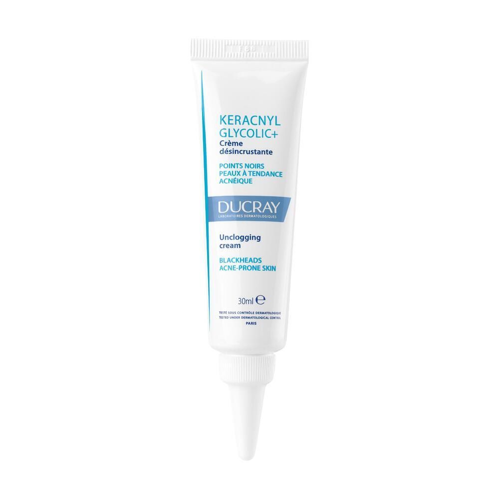 Tube de crème blanc. Inscription : KERACNYL GLYCOLIC+ Crème désincrustante. Logo DUCRAY. 30ml.