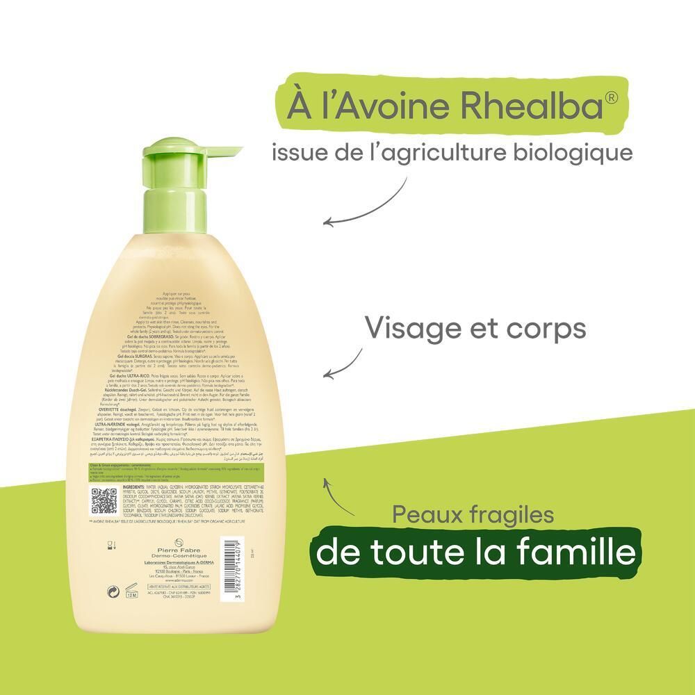 Flacon de gel douche avec zones de texte vertes. Texte: À l'Avoine Rhealba, Visage et corps, Peaux fragiles.