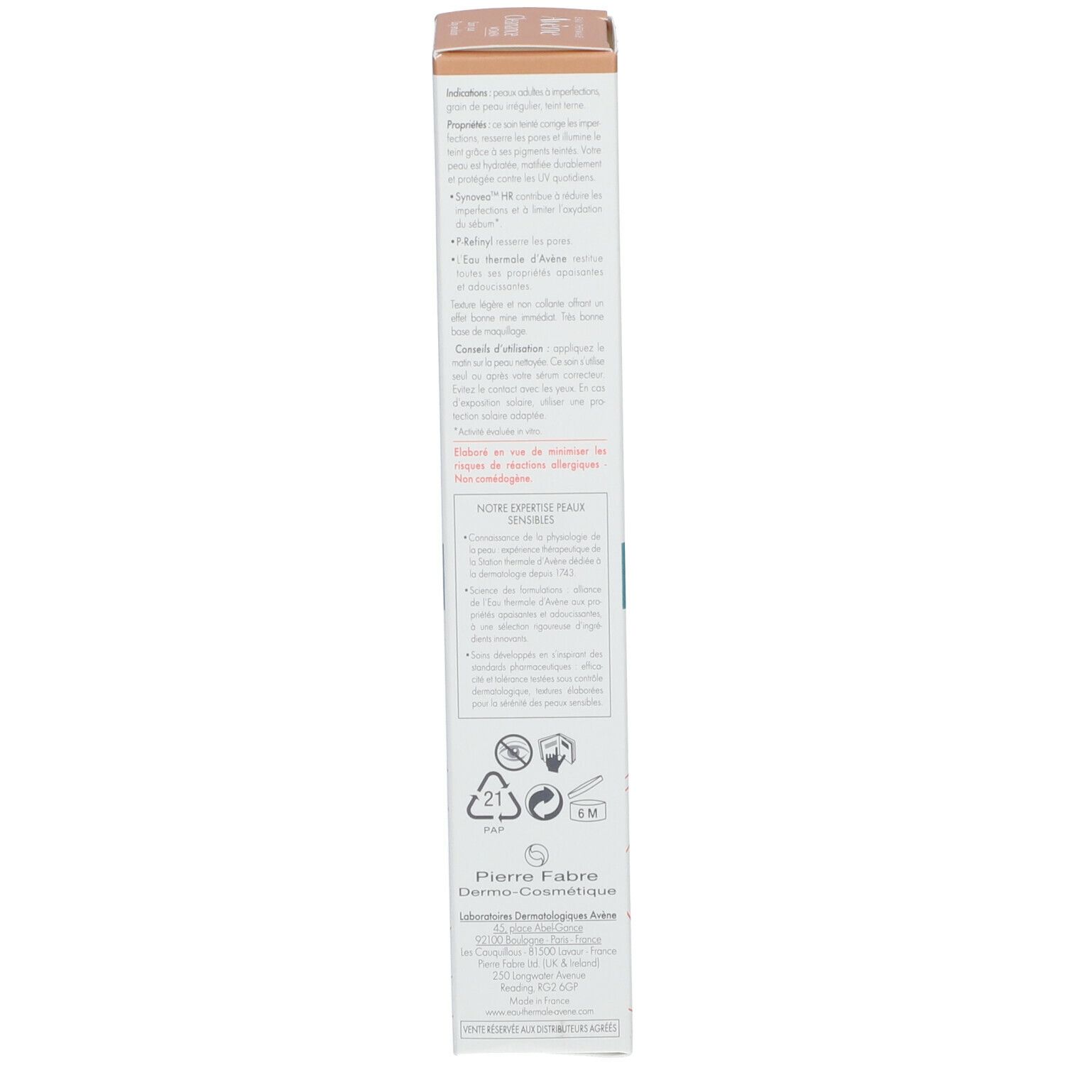 Dos de l'emballage en carton. Texte multilingue. Fabricant: Pierre Fabre Dermo-Cosmétique. Symboles de recyclage.