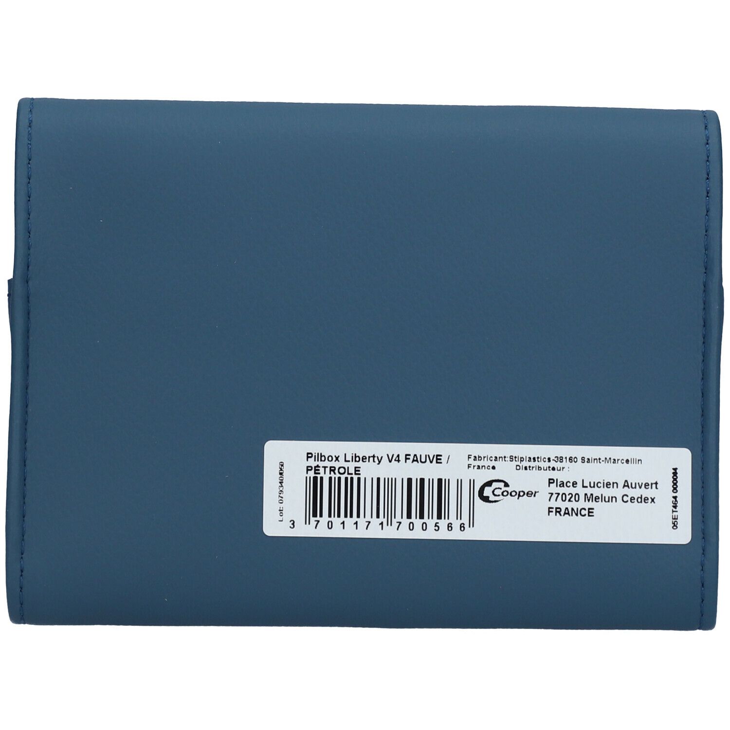 Rückseite des blauen Etuis. Weißes Etikett mit Produktinformationen und Barcode.
