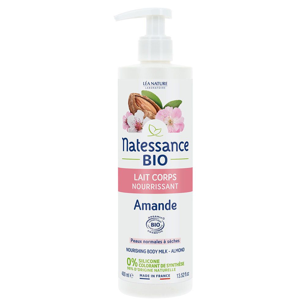 Flacon blanc avec pompe. Inscription: Natessance BIO Lait Corps Nourrissant Amande. Illustration d'amandes et fleurs.