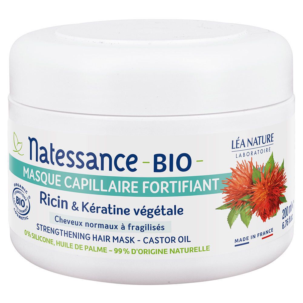 Pot blanc avec étiquette. Texte: Natessance BIO, masque capillaire, ricin & kératine végétale. Avec label bio.