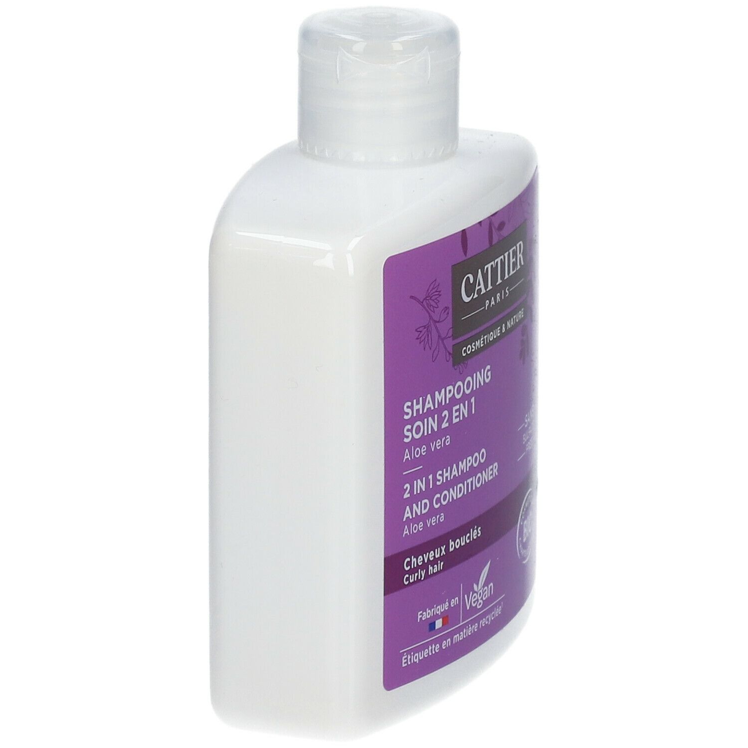 Flacon blanc avec étiquette violette. Texte: CATTIER, Shampooing Soin 2-en-1, 2 in 1 Shampoo and Conditioner, Cheveux bouclés, Vegan.