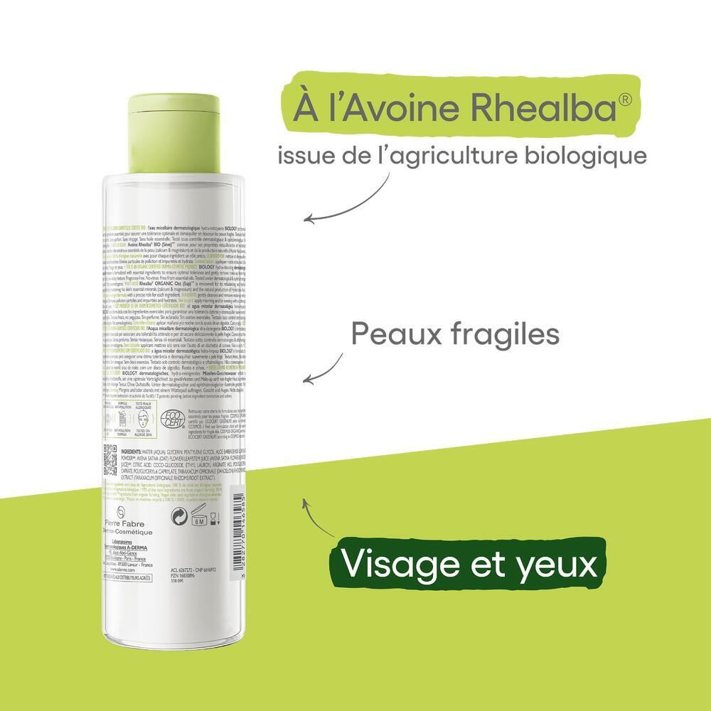 Dos de la bouteille avec texte et flèches. Texte: À l'Avoine Rhealba, Peaux fragiles, Visage et yeux.