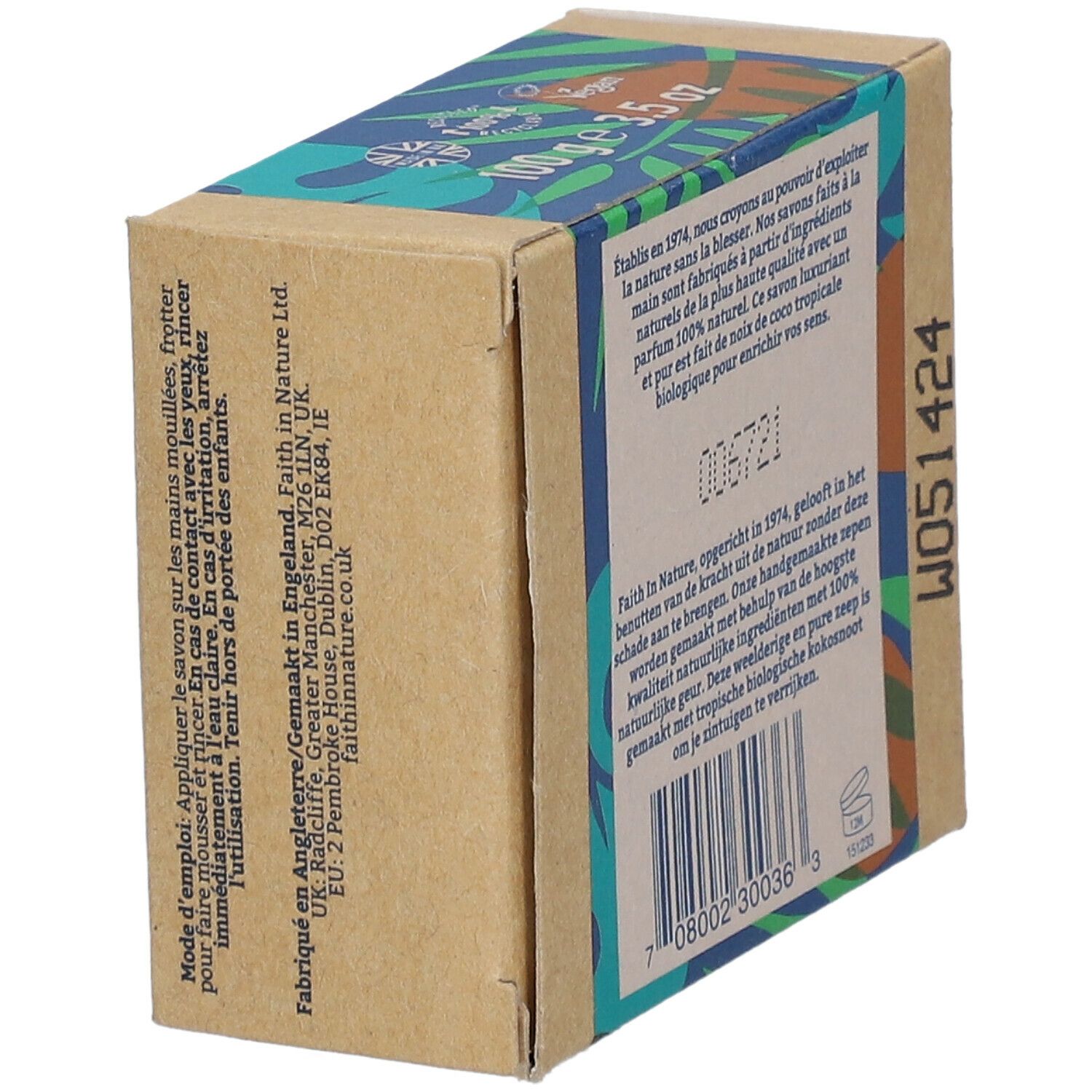 Kartonverpackung mit Text. FAITH IN NATURE, Kokosnuss, Savon/Zeep. Grün-blaue Musterung. Vegan-Siegel. Herstellerinformationen.
