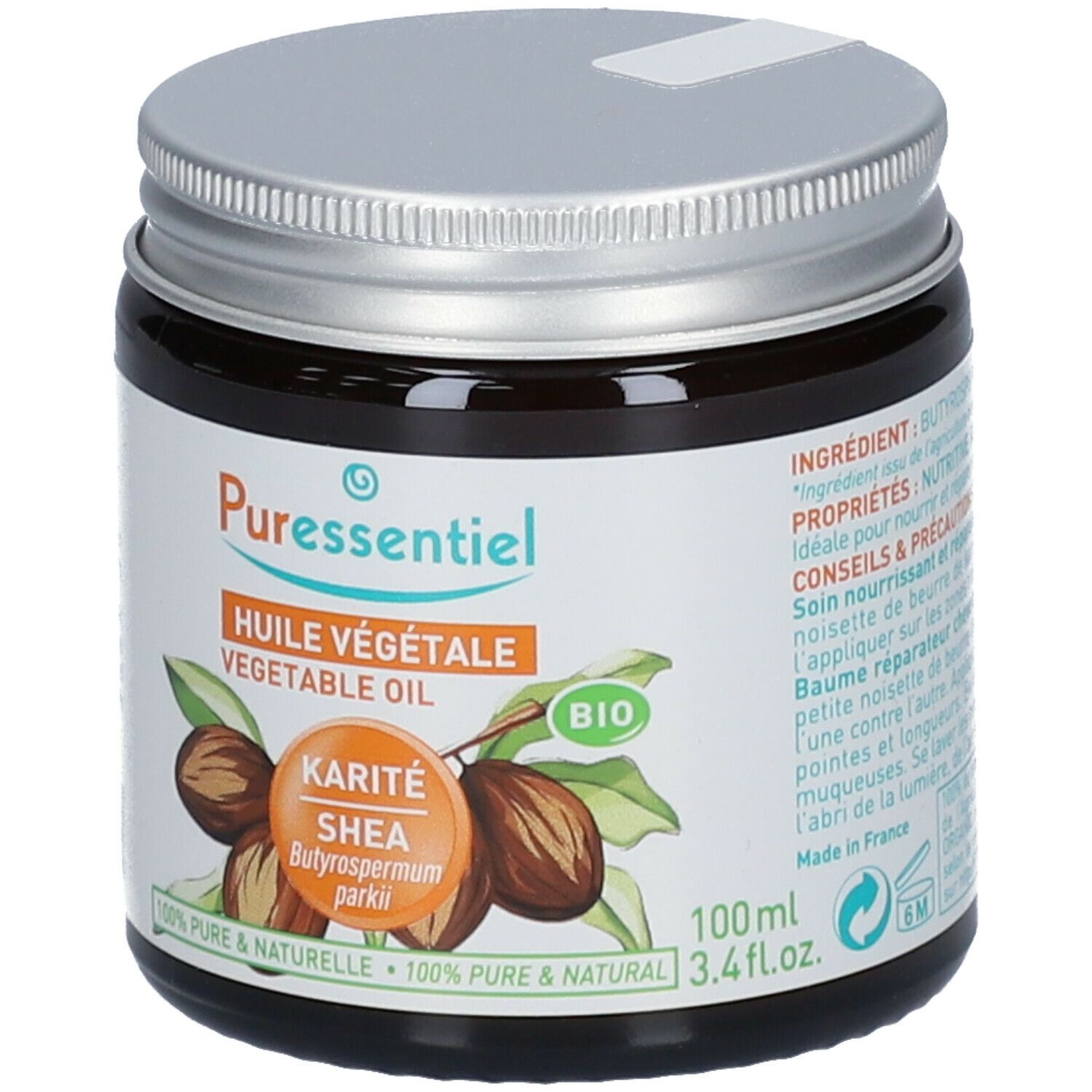 Pot en verre brun avec couvercle argenté. Inscription : Puressentiel, Huile Végétale, Karité Shea, Bio. 100ml, 3.4 fl.oz.