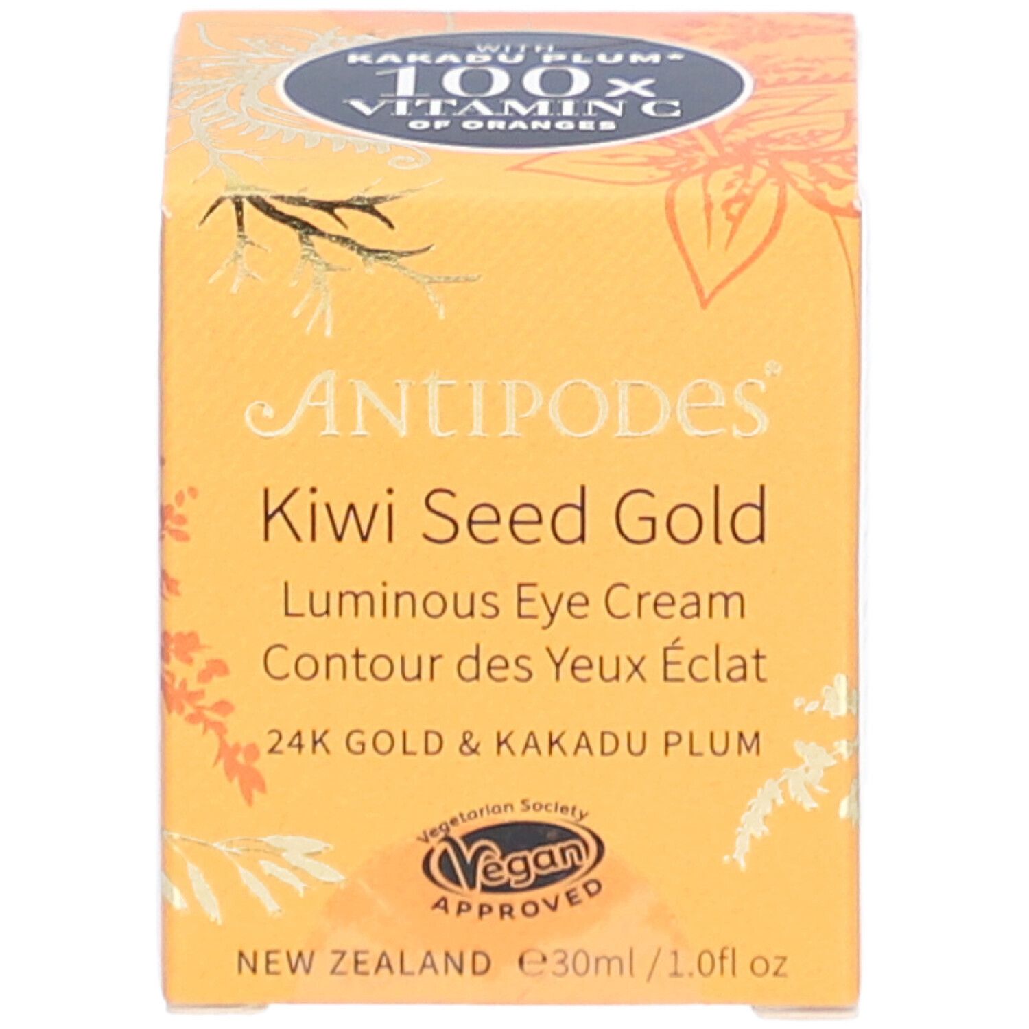 Boîte jaune avec nom et logo du produit. Contient Kiwi Seed Gold Luminous Eye Cream. Label végétalien.