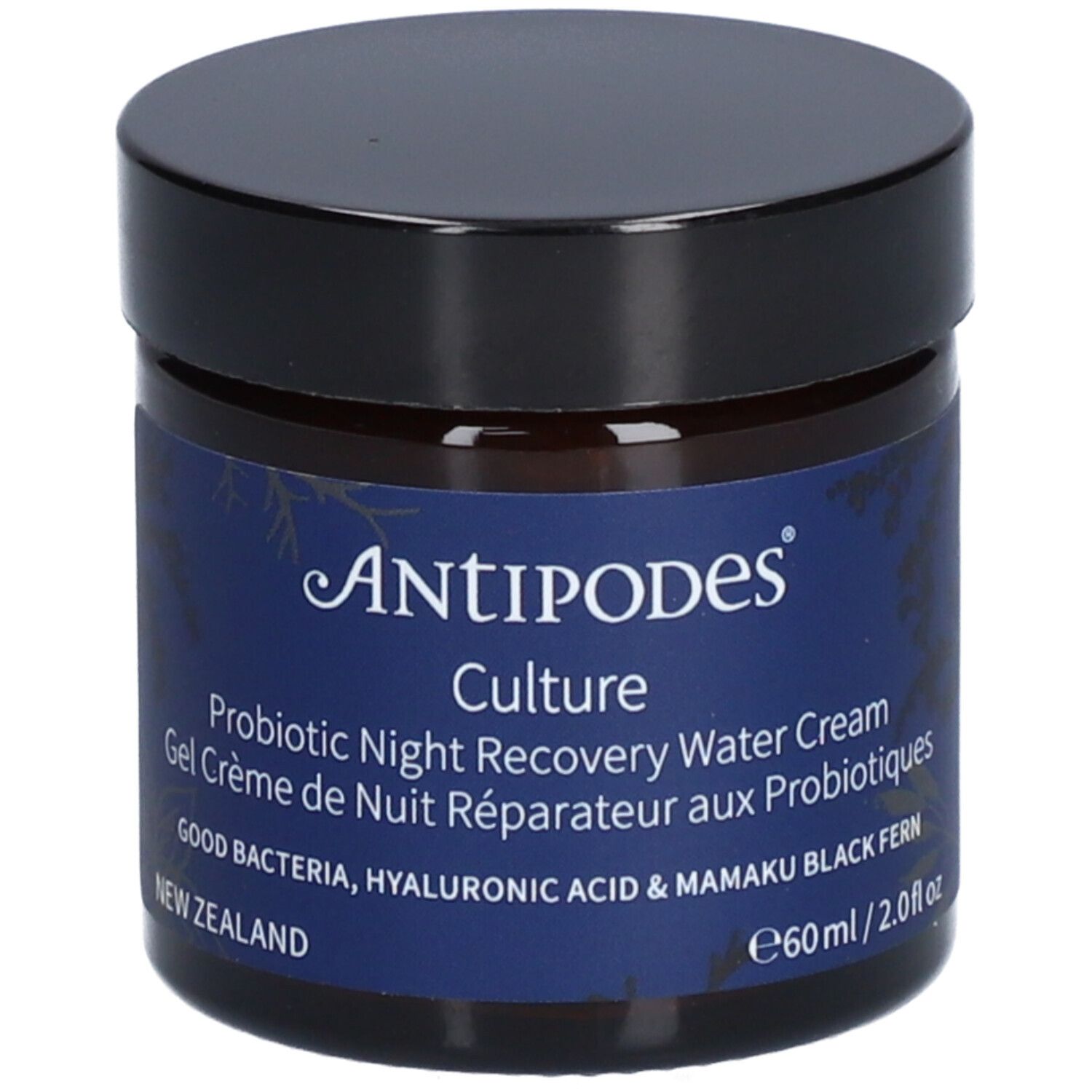 Pot en verre foncé, couvercle noir. Étiquette bleue: Antipodes Culture, crème de nuit. Label végétalien.