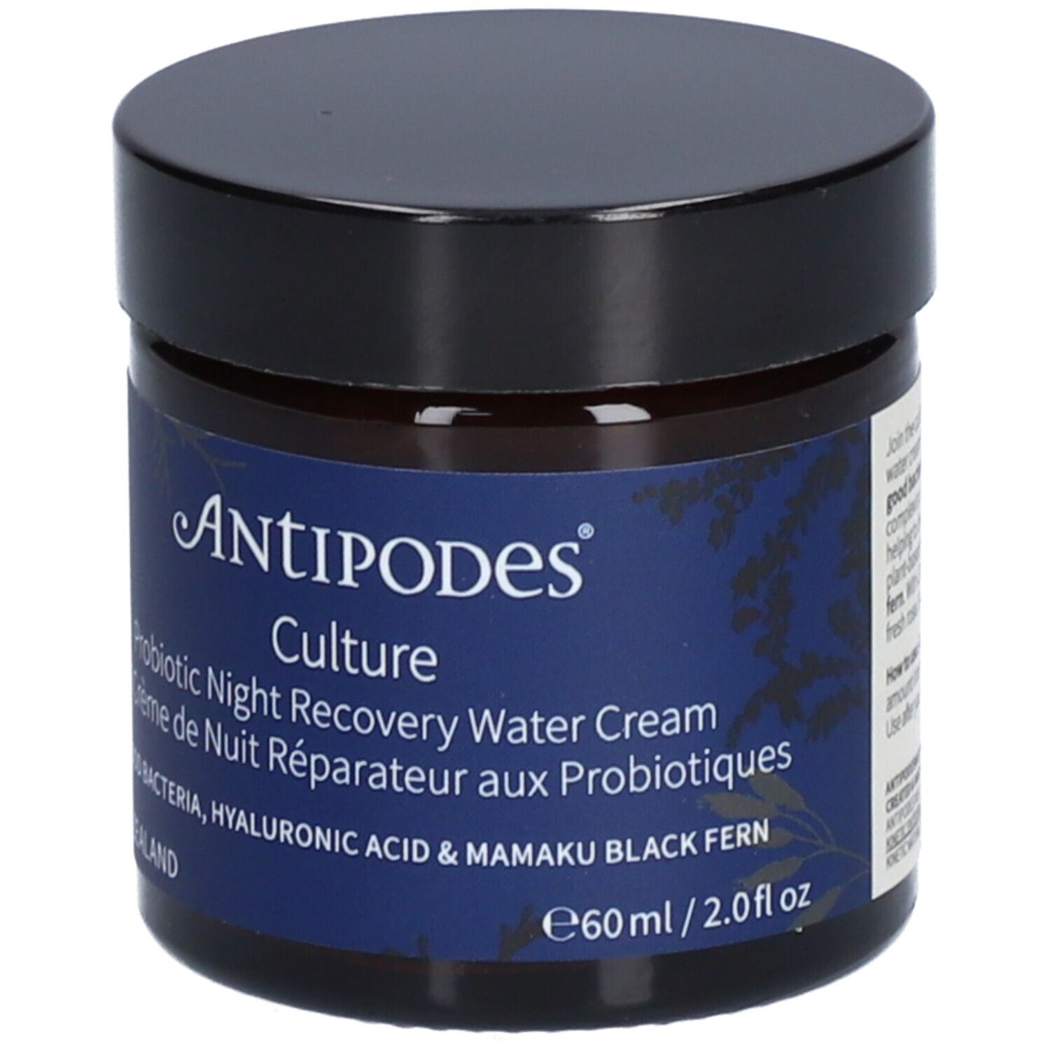 Pot foncé, couvercle noir. Étiquette bleue: Antipodes Culture, crème de nuit. 60ml.