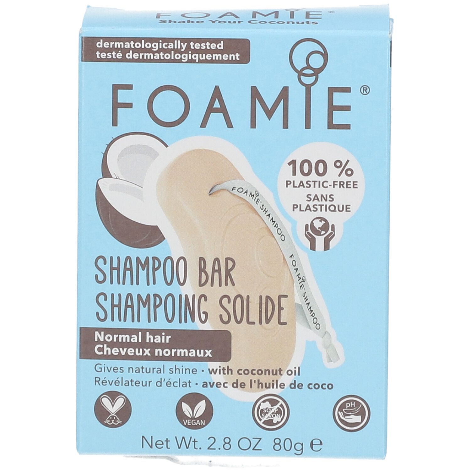 Boîte bleu clair avec logo FOAMIE et barre de shampooing. Texte : "Shampooing Solide", "huile de coco", "vegan".