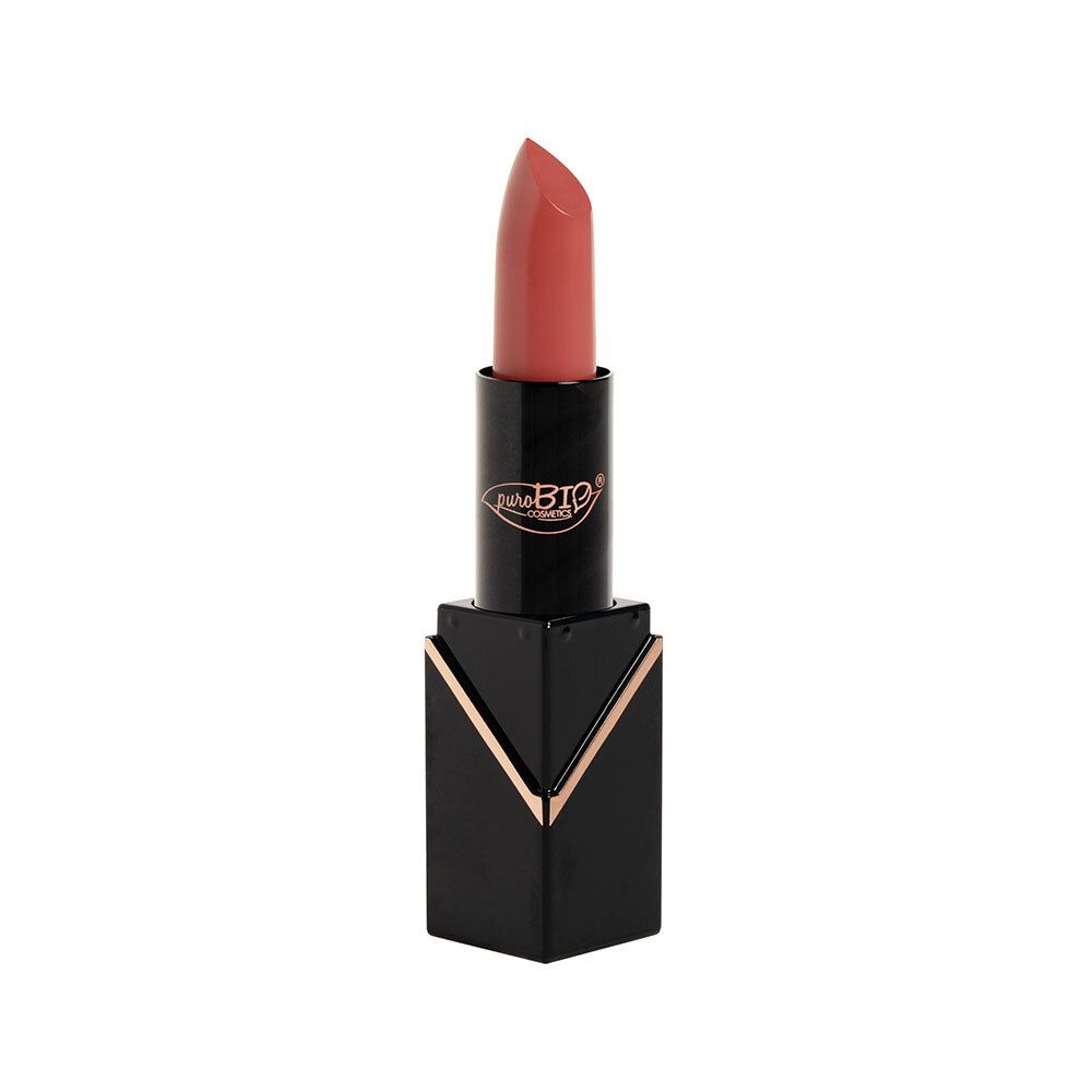 Rouge à lèvres pêche, boîtier noir avec accents dorés. Marque visible.