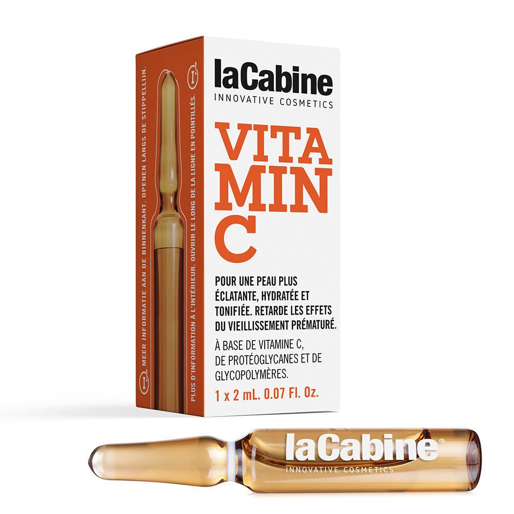 Ampoule LaCabine Vitamin C et emballage. Ampoule brune, emballage orange avec texte. Nom du produit : Vitamine C.