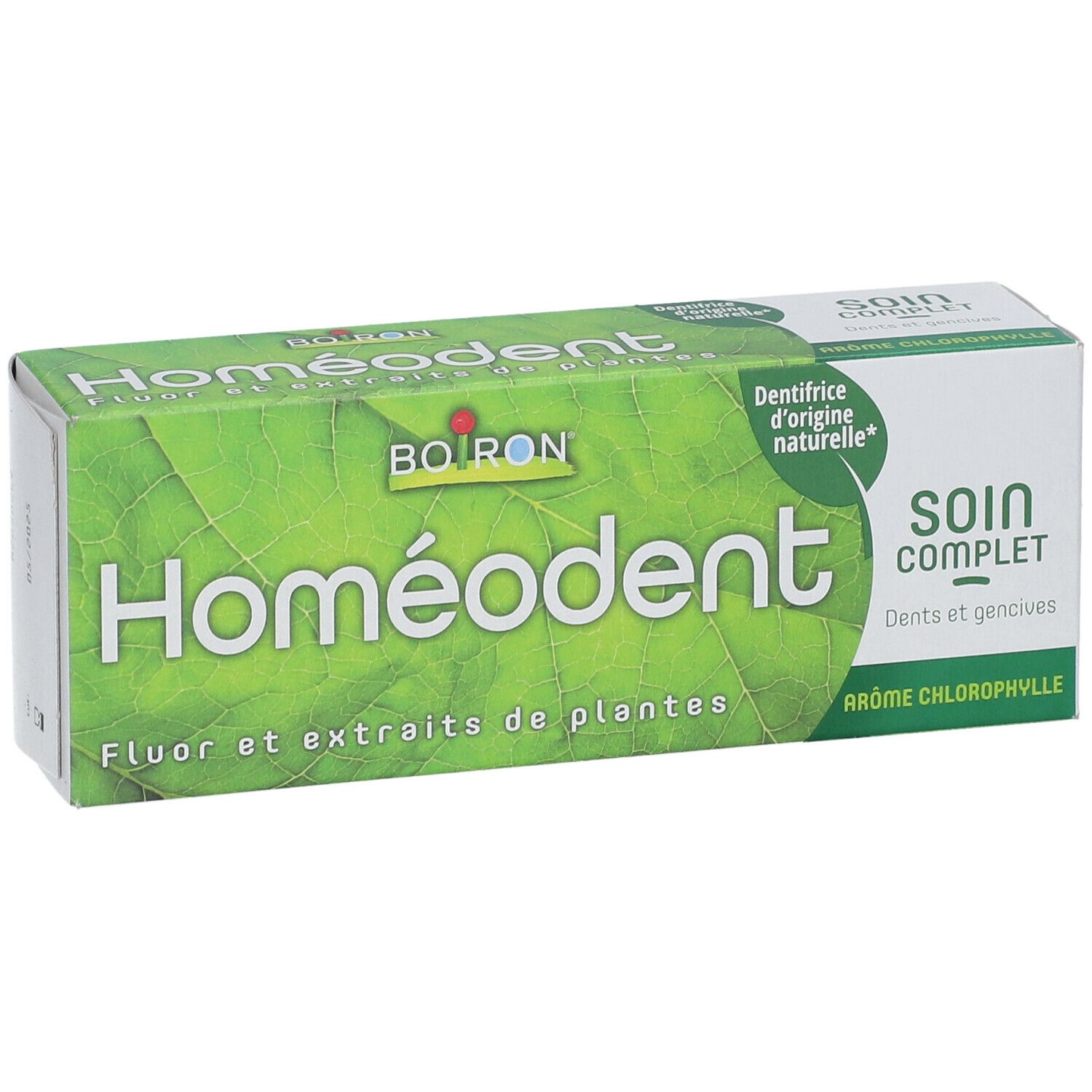 Boîte verte "Homéodent". Contient fluor et extraits de plantes. "Soin Complet" et "Arôme Chlorophylle" sont également visibles.