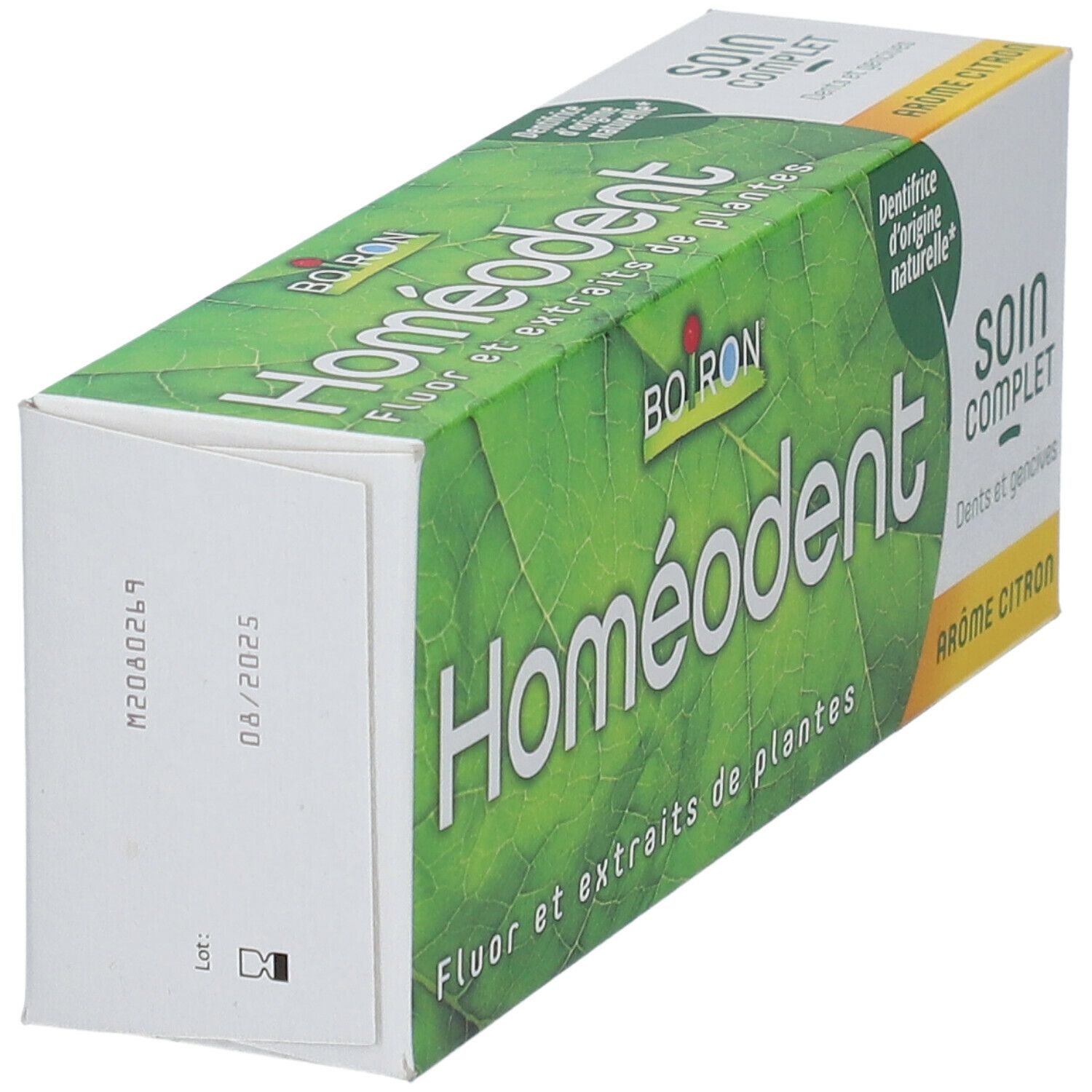 Boîte Homeodent, design feuilles vertes. Inscription: Homeodent, Soin Complet, Arôme Citron. Marque Boiron.