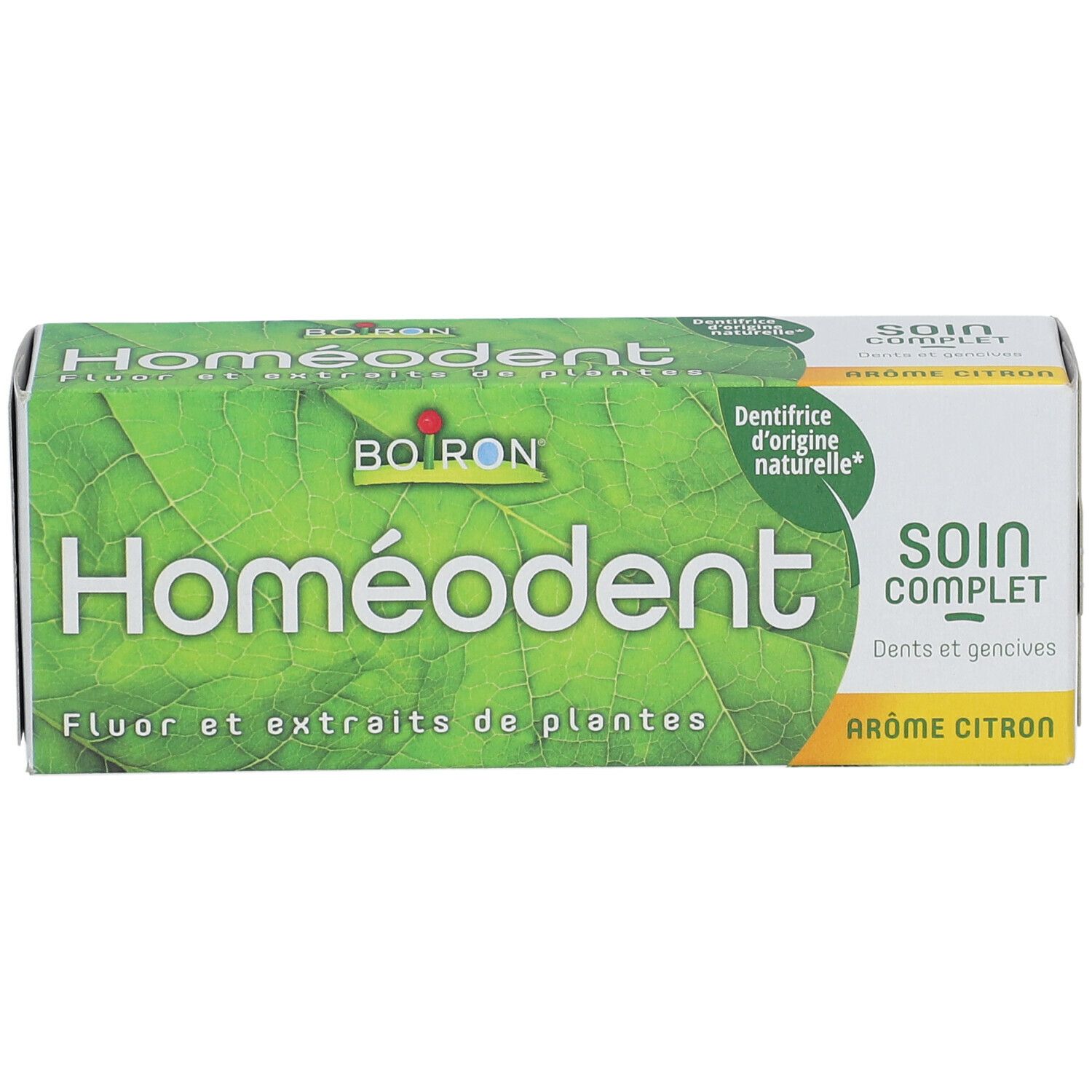 Boîte Homeodent, verte. Inscription: Homeodent, Soin Complet, Arôme Citron. Marque Boiron.