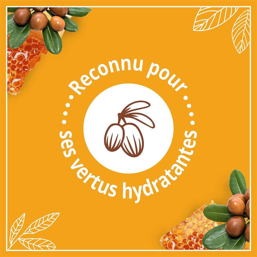 Étiquette circulaire avec 'Reconnu pour ses vertus hydratantes' sur fond jaune. Illustration de noix de karité.