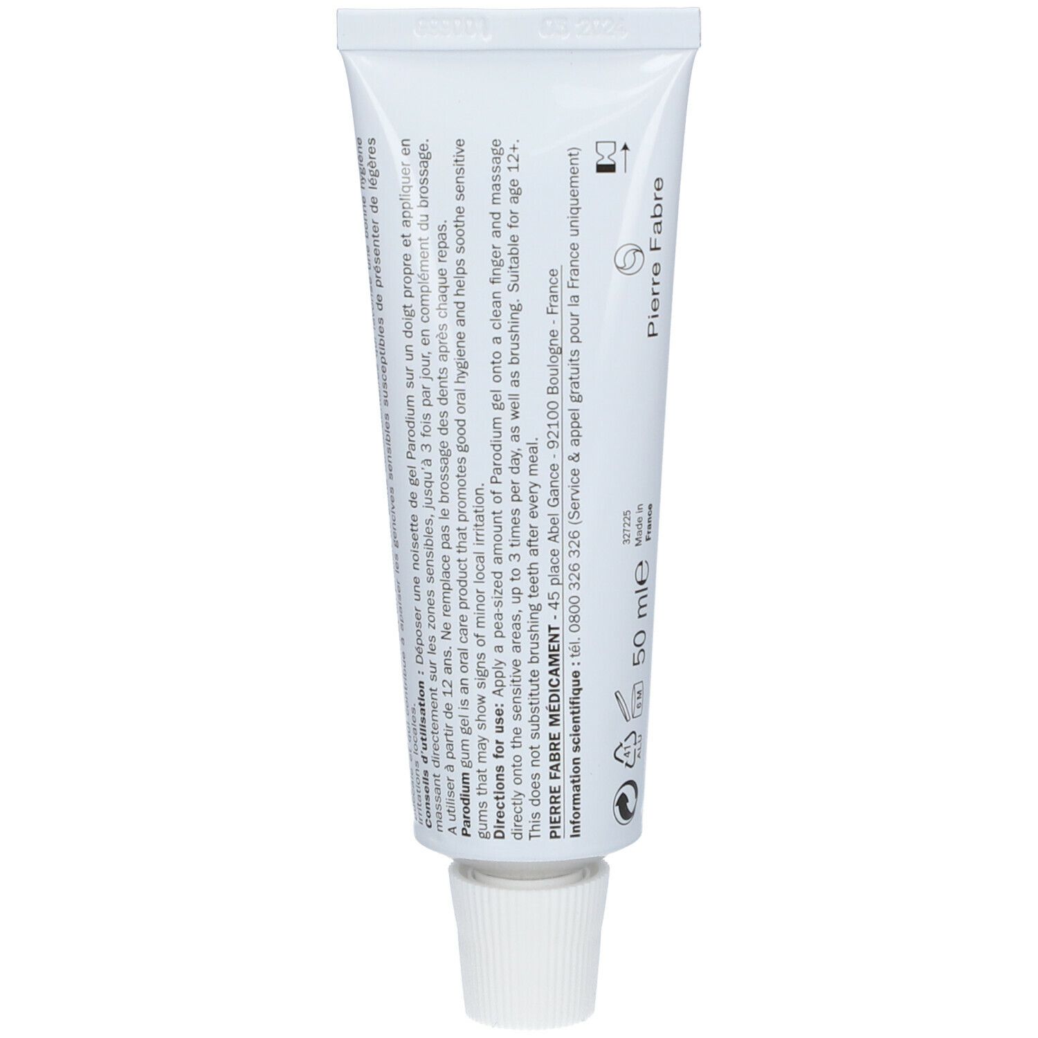 Dos du tube de gel gingival. Texte et logos. Informations du fabricant et ingrédients.