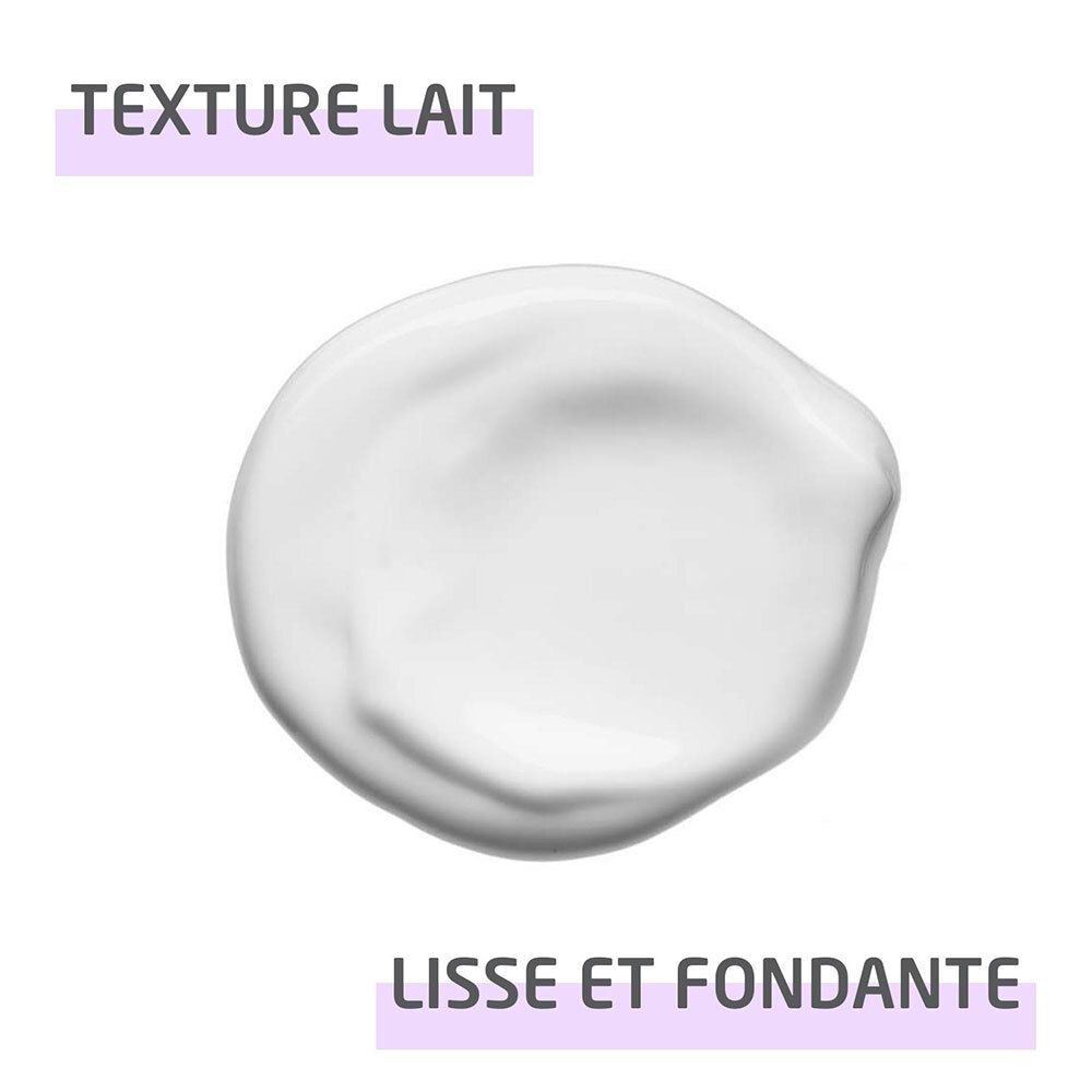 Échantillon de crème blanche. Texte: Texture Lait, Lisse et fondante.