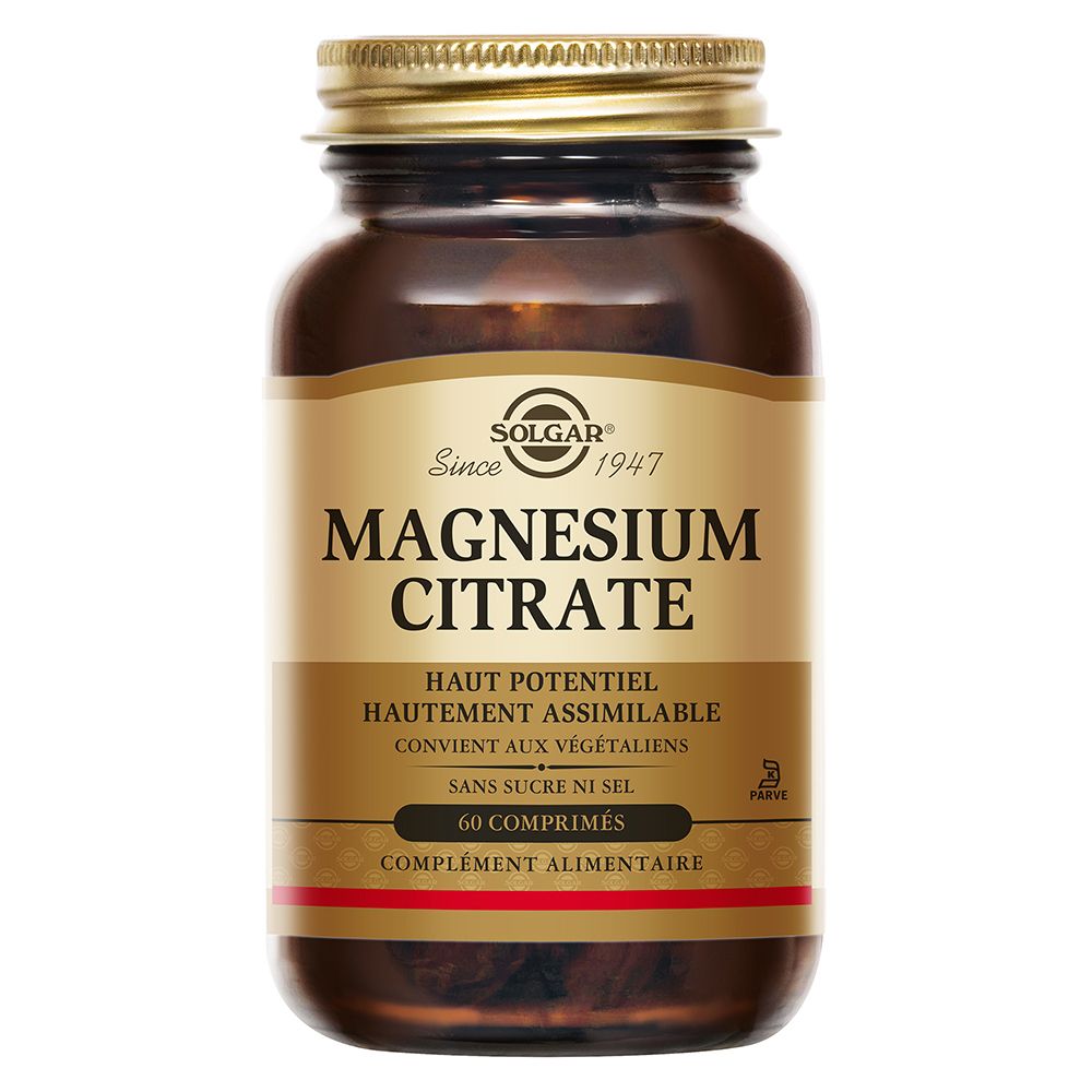 Flacon en verre brun avec bouchon doré. Étiquette "Magnesium Citrate" et logo SOLGAR.