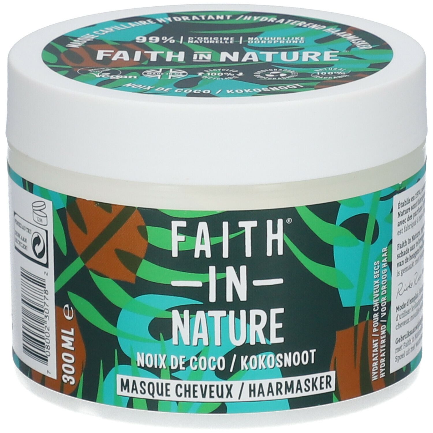 Pot rond avec étiquette verte et blanche. Inscription: FAITH IN NATURE, masque capillaire à la noix de coco. 300 ml. Couvercle avec logo et texte.