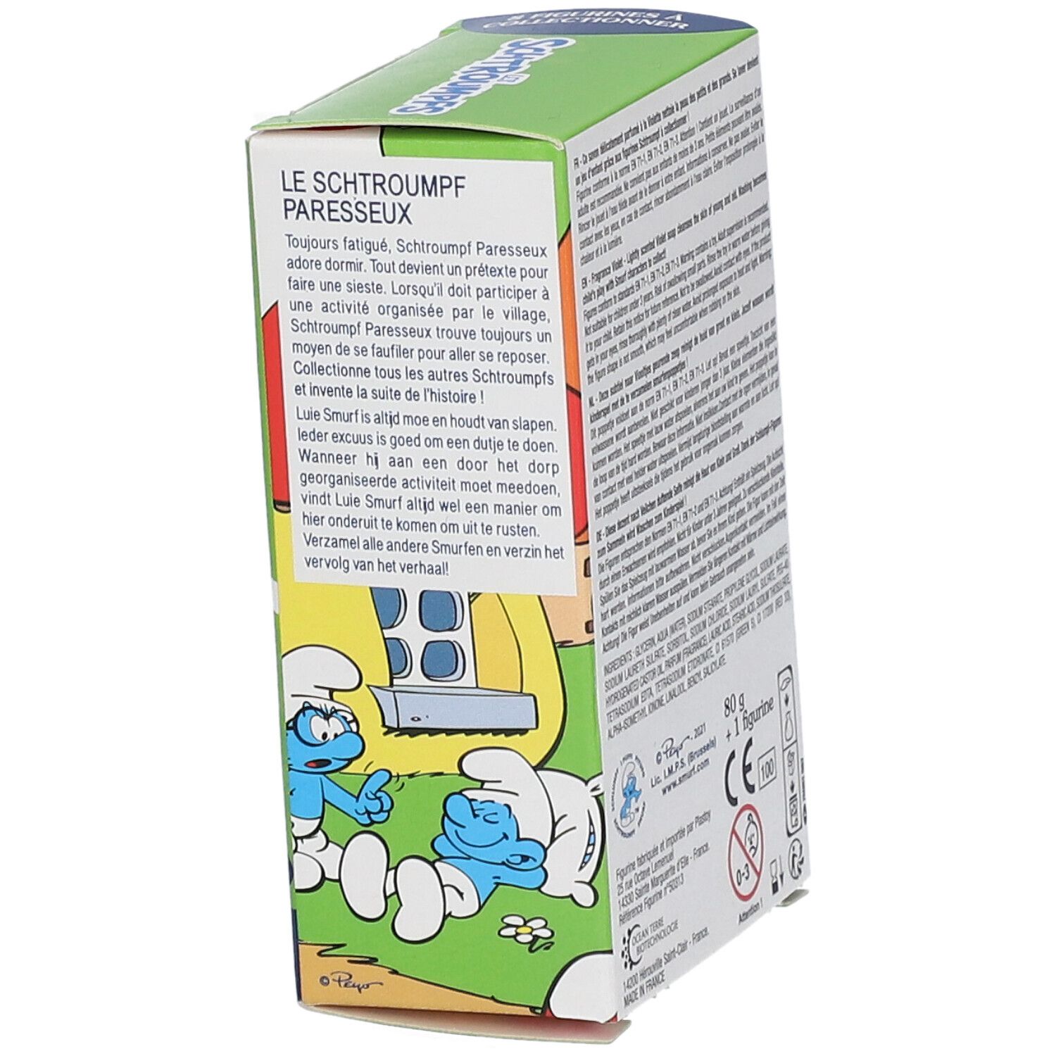 Boîte de savon. Texte: Le Schtroumpf Paresseux, illustration d'un Schtroumpf endormi, texte multilingue.