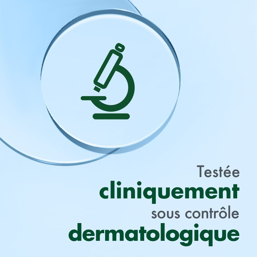 Symbole de microscope. Texte : Testé cliniquement sous contrôle dermatologique.