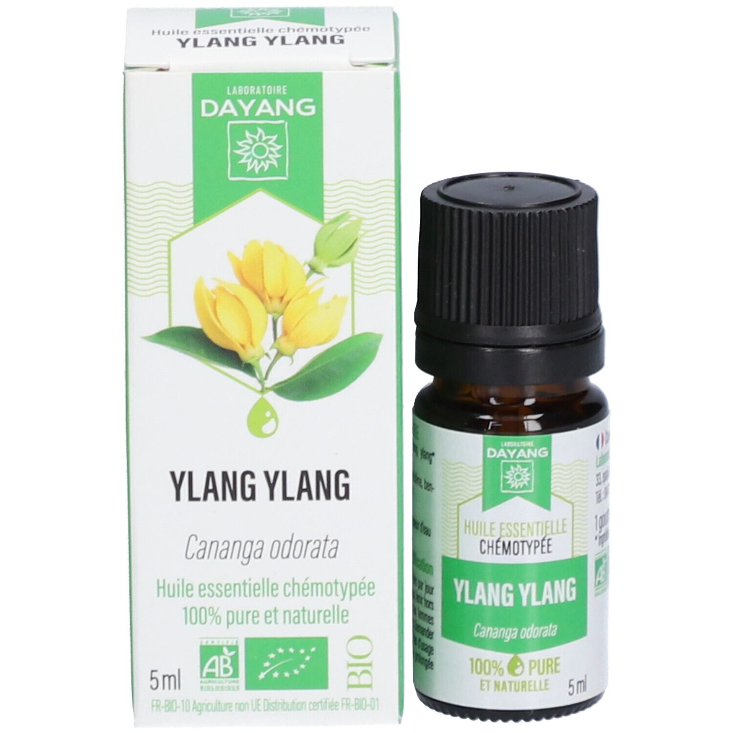 Flacon et emballage DAYANG Ylang Ylang. Flacon avec bouchon noir, étiquette. Emballage avec motif floral et texte.