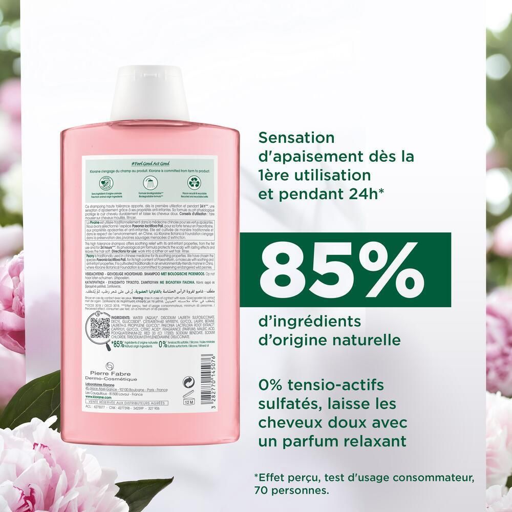 Dos du flacon rose. Texte: 85% ingrédients naturels, 0% sulfates, shampooing doux.