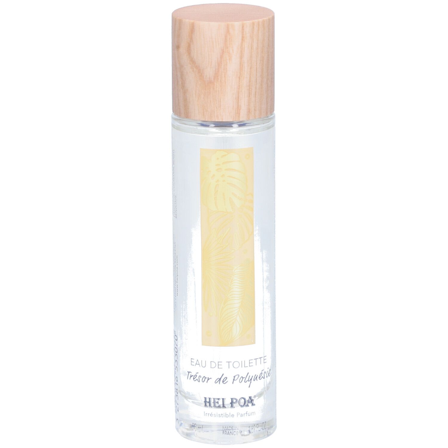 Flacon cylindrique en verre avec bouchon en bois. Étiquette avec motif de feuille jaune et texte: EAU DE TOILETTE Trésor de Polynésie. Marque: HEI POA.