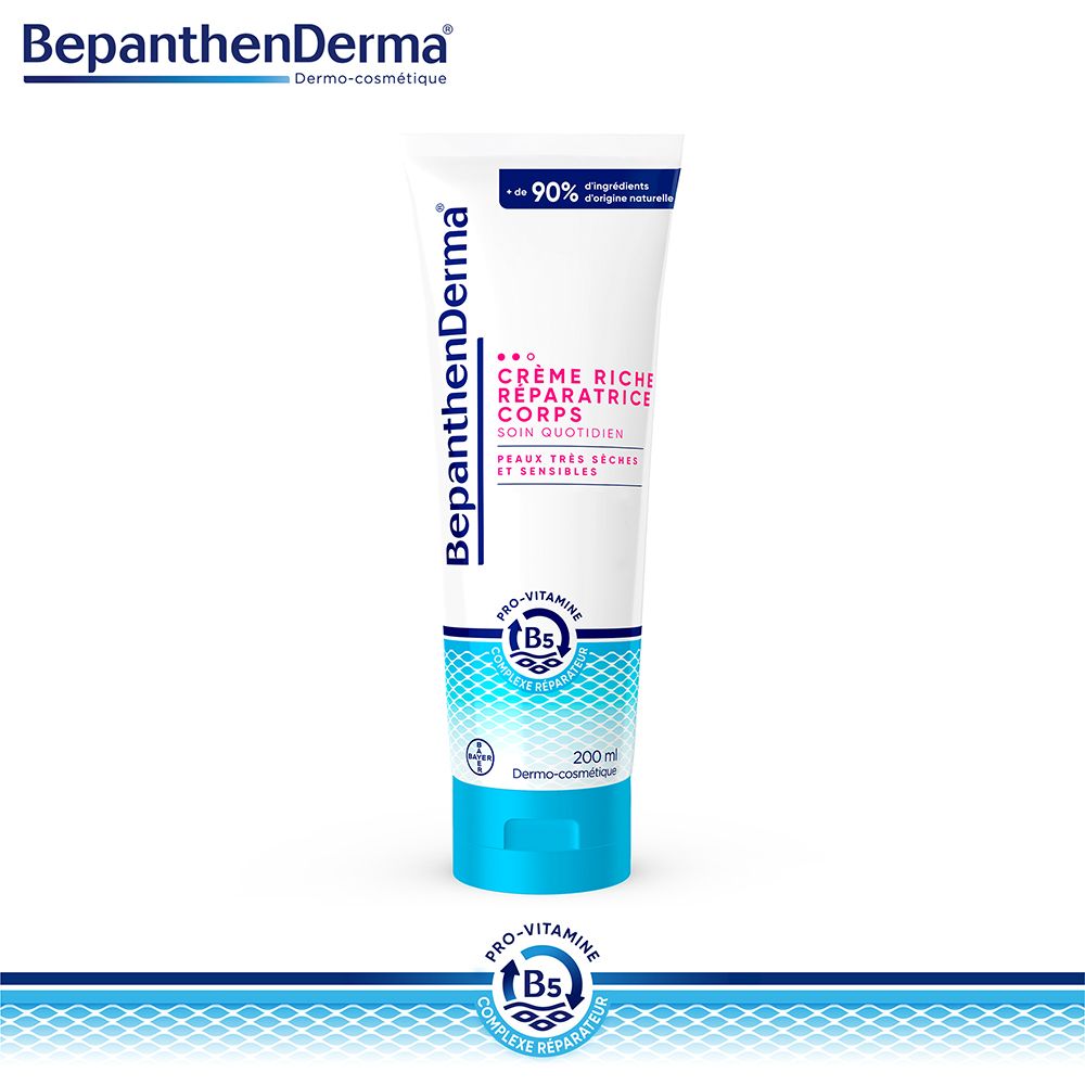 Tube de crème blanc et bleu. Texte: BepanthenDerma, Crème Riche Réparatrice Corps, 200 ml.
