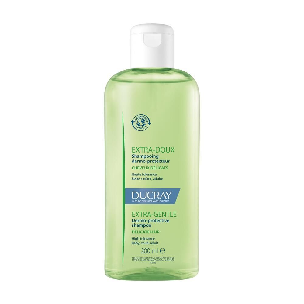 Flacon vert avec bouchon blanc. Inscription : EXTRA-DOUX, DUCRAY, shampooing pour cheveux délicats. 200 ml.