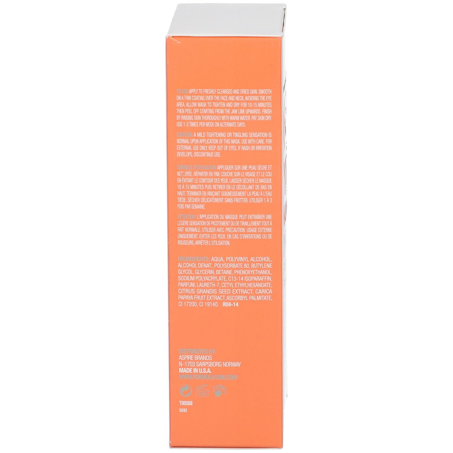 Emballage blanc, vue latérale. Texte avec ingrédients et instructions d'utilisation. Fond orange.