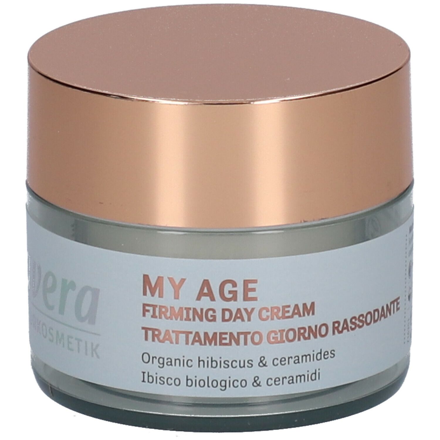 Pot en verre avec couvercle rose. Inscription: MY AGE, Firming Day Cream, Trattamento giorno rassodante. Avec ingrédients.