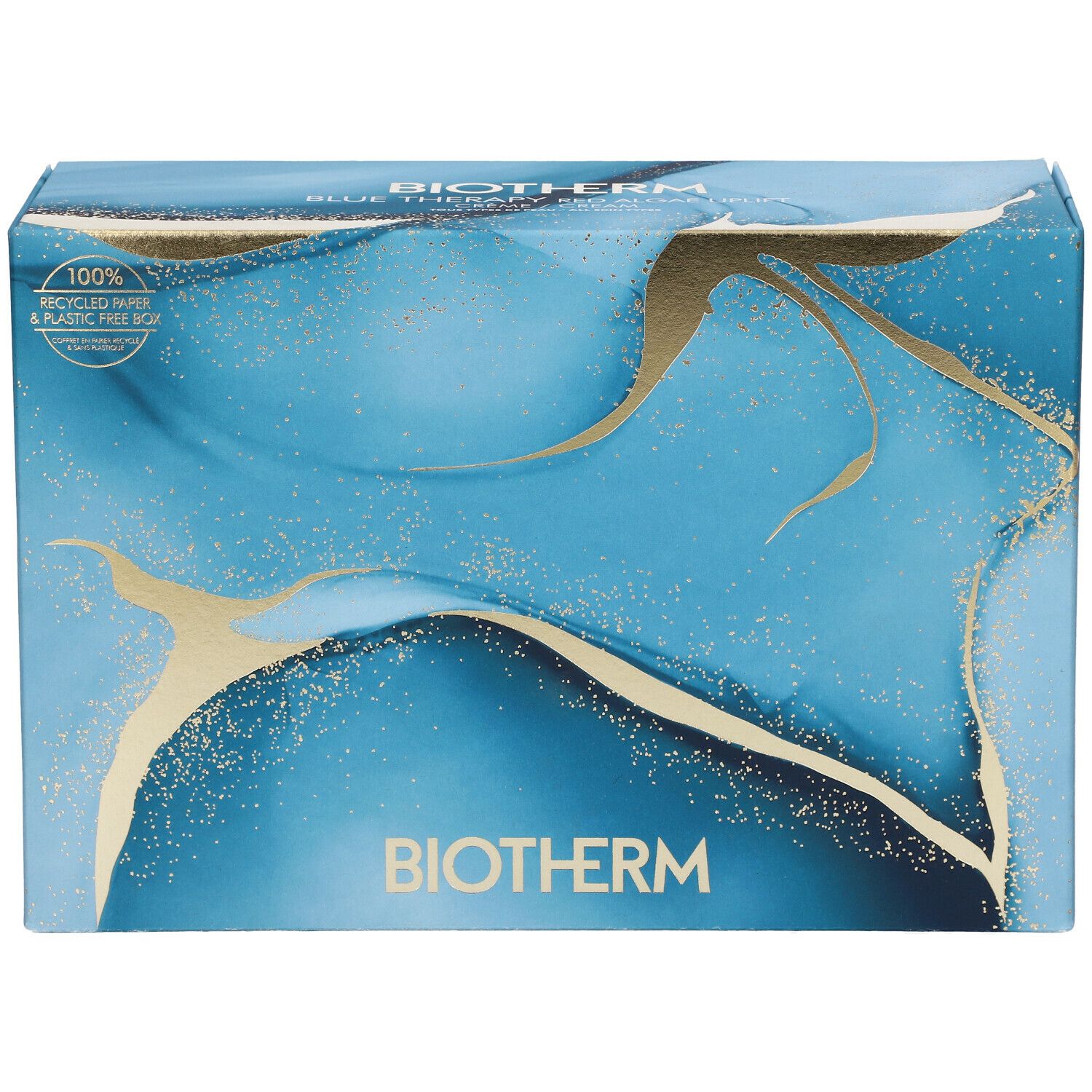 Blau-goldene Geschenkbox. BIOTHERM-Logo. Aufdruck: BIOTHERM BLUE THERAPY. Verpackung aus recyceltem Papier und ohne Plastik.